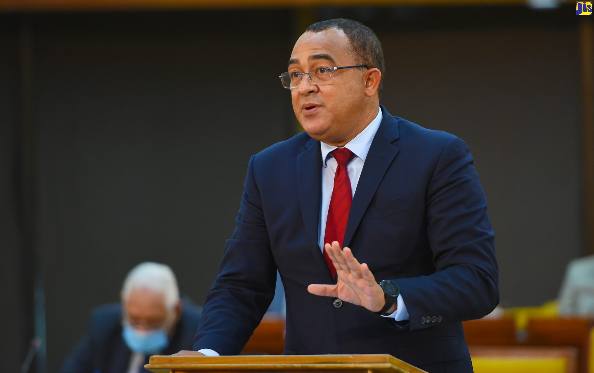Minister of Health and Wellness, Dr. the Hon Christopher Tufton, emphasises a point while making a statement in the House of Representatives on November 3, at the Jamaica Conference Centre.