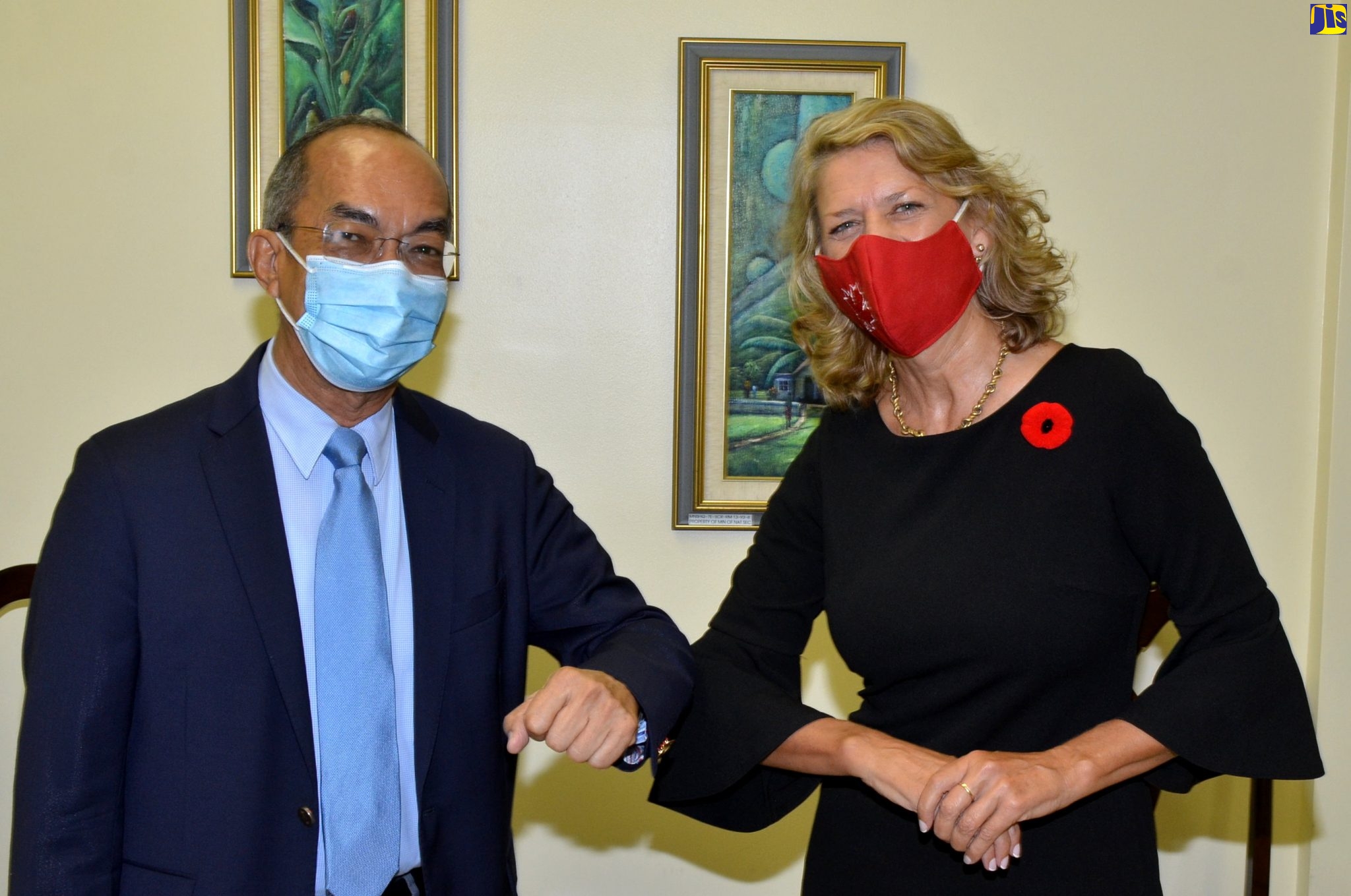 Minister of National Security, Hon. Dr. Horace Chang (left), greets Canadian High Commissioner to Jamaica, Her Excellency Laurie Peters, when she visited the Ministry on November 4 to say farewell.