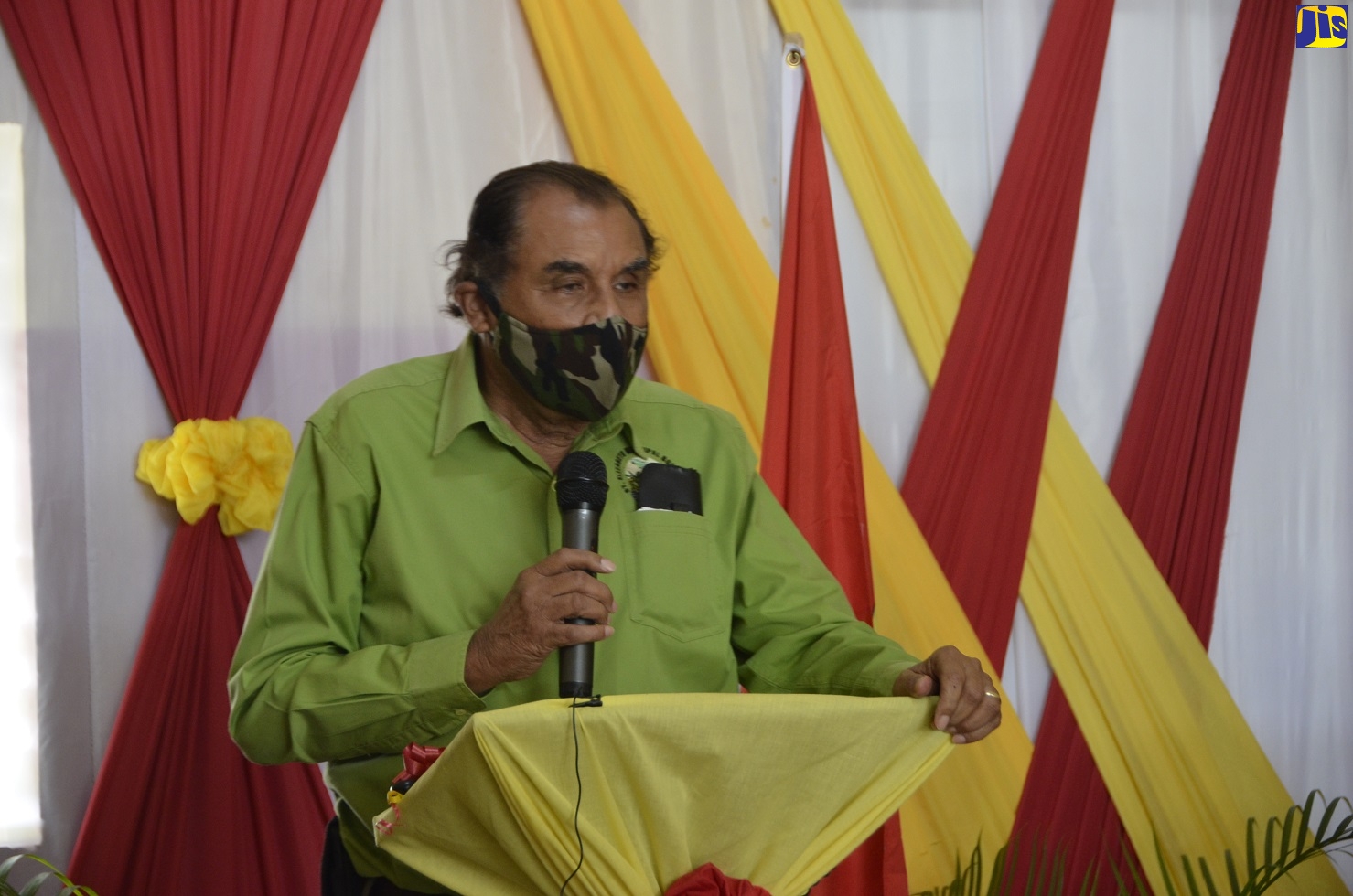 Mayor of Black River, Councillor Derrick Sangster, speaks at a ceremony to hand over a skid unit to the Santa Cruz Fire station in St Elizabeth, on December 9.