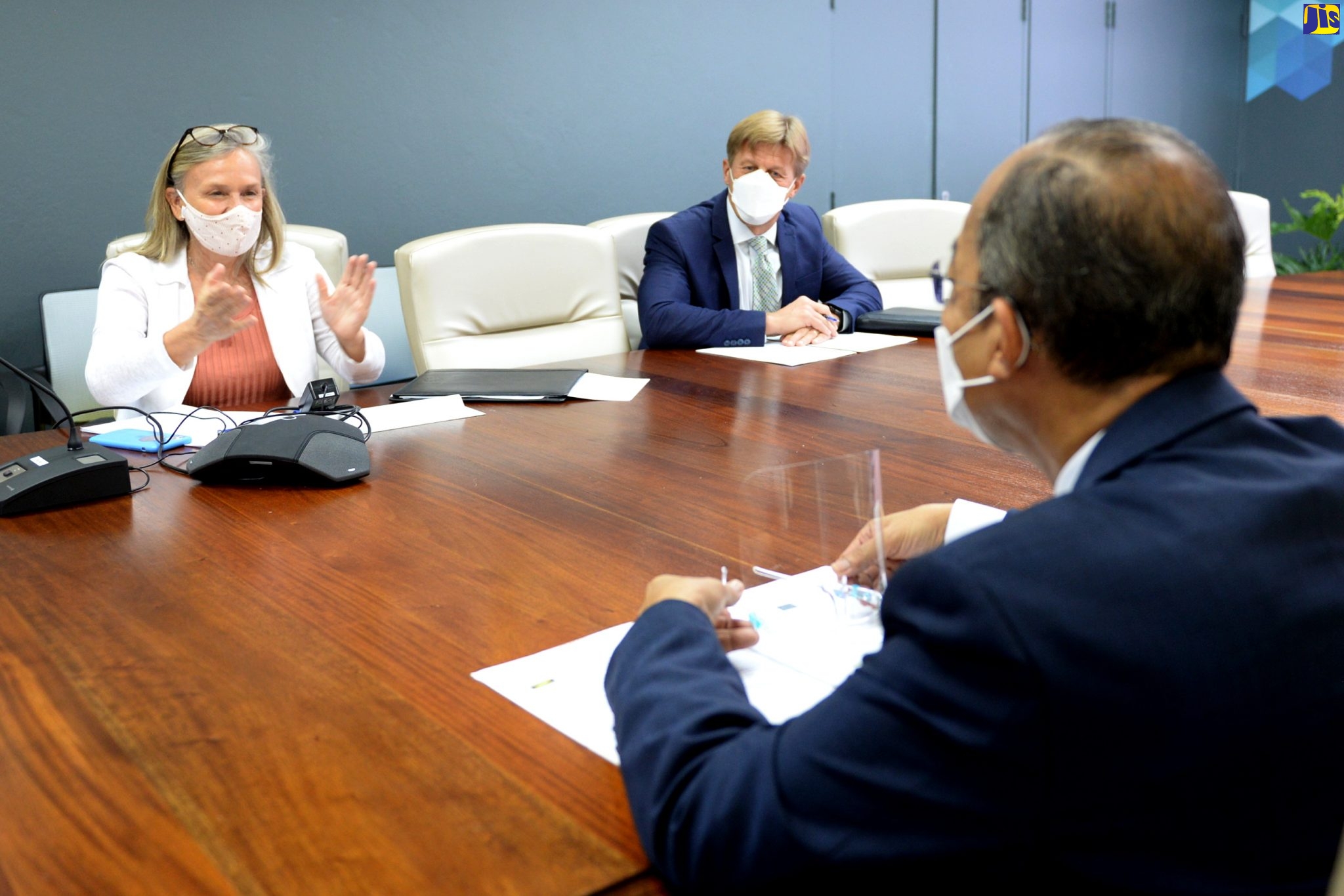 Deputy Prime Minister and Minister of National Security, Hon. Dr. Horace Chang (right) conversing with Head of Delegation of the European Union in Jamaica, Belize, The Bahamas, Turks and Caicos Islands and the Cayman Islands, Ambassador Marianne Van Steen (centre) and Deputy Head of Mission, Fredrik Ekfeldt. The diplomats paid a courtesy call on Dr. Chang, at the Ministry’s 2 Oxford Road location in St. Andrew, recently.