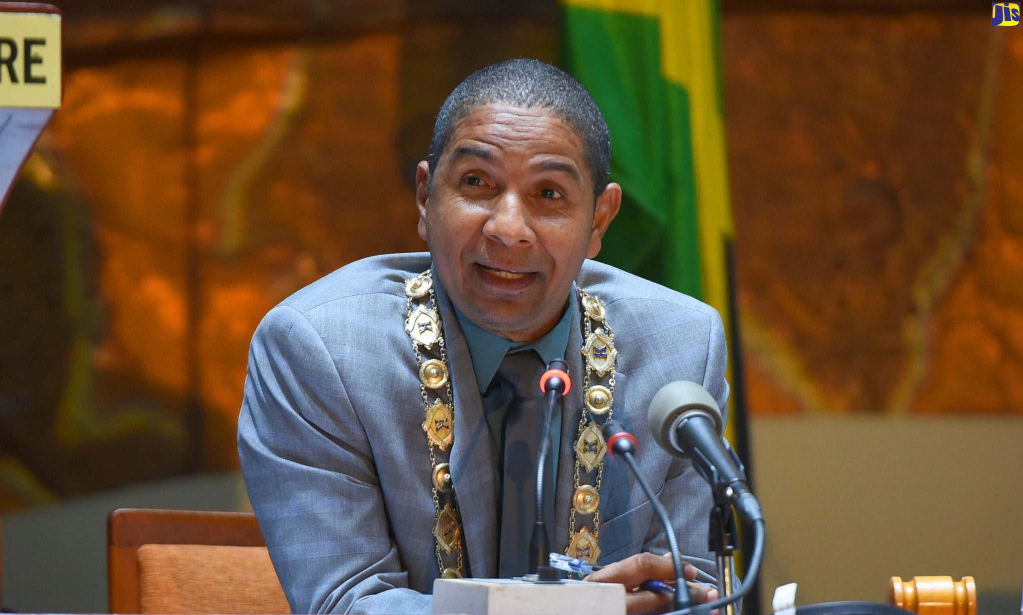 Mayor of Kingston, Senator Councillor Delroy Williams, addresses the monthly meeting of the  Kingston and St. Andrew Municipal Corporation, at the Jamaica Conference Centre in downtown Kingston, on December 8.


