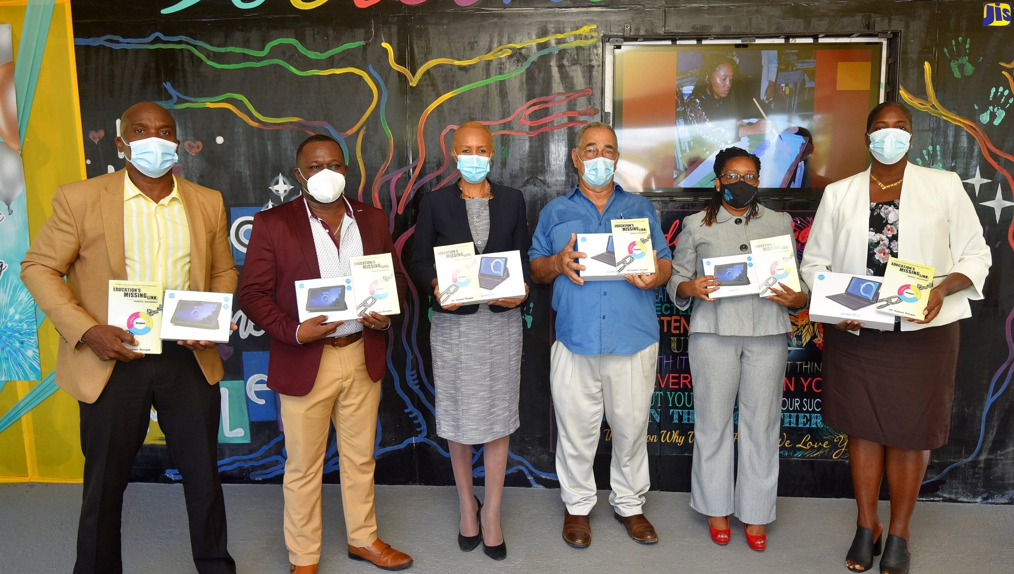 Custos Of Clarendon Donates 60 Tablets To High-School Students