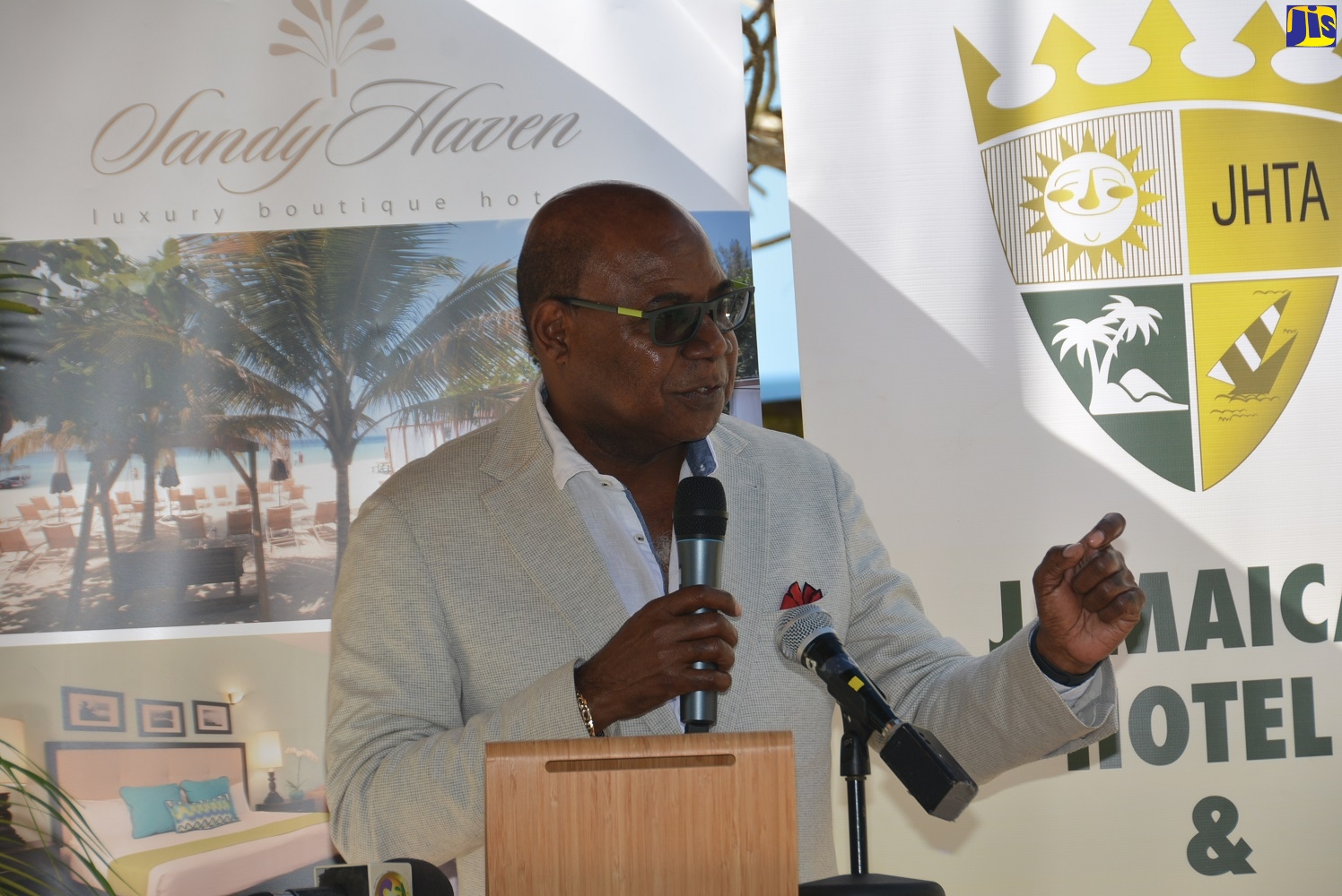 Minister of Tourism, Hon. Edmund Bartlett, speaking at the launch of the Jamaica Hotel and Tourist Association (JHTA) Negril Chapter