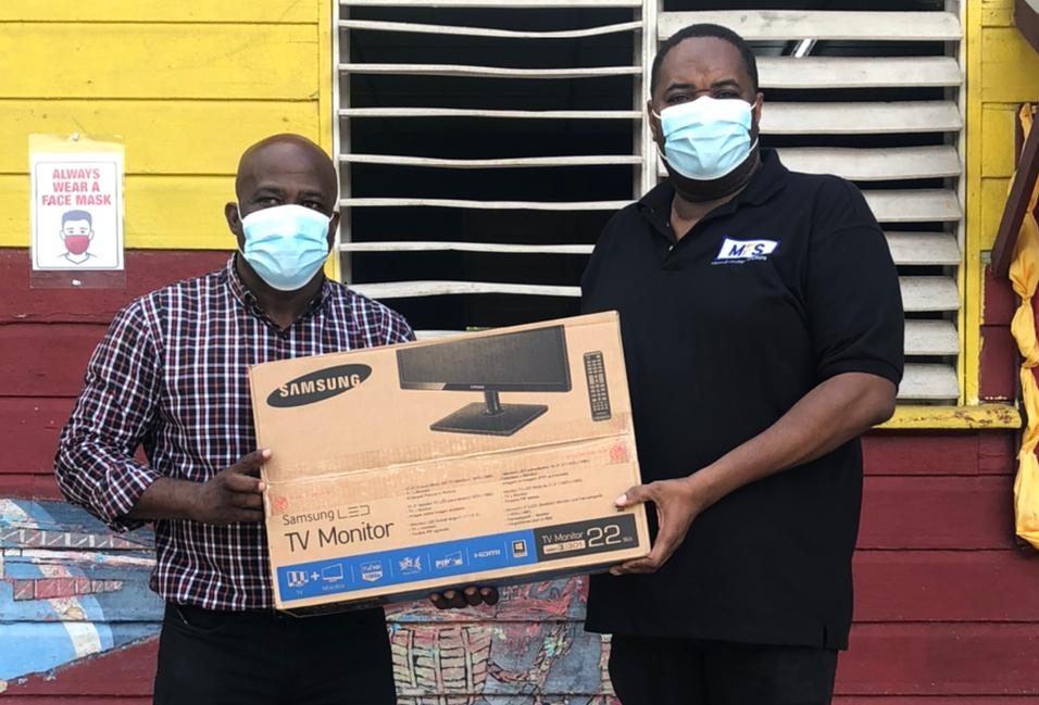 School Gets Computers And Other Supplies From Micro- Financing Solutions