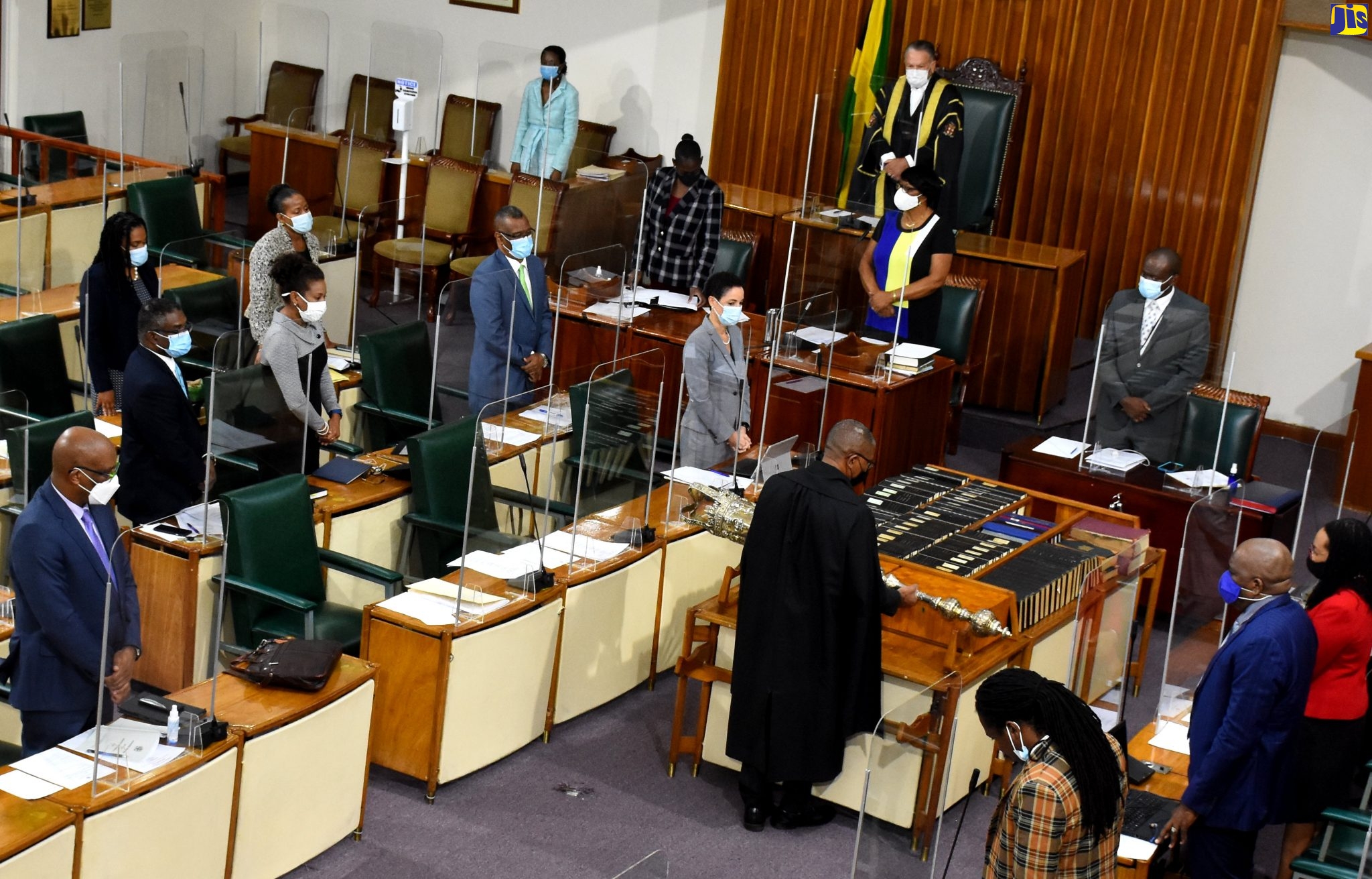 Members of the Senate wait to proceed, as Marshal to the Houses of Parliament, Captain Wayne Blake (centre), places the Mace on the table of the House, at the start of Friday’s (Jan. 15) sitting.