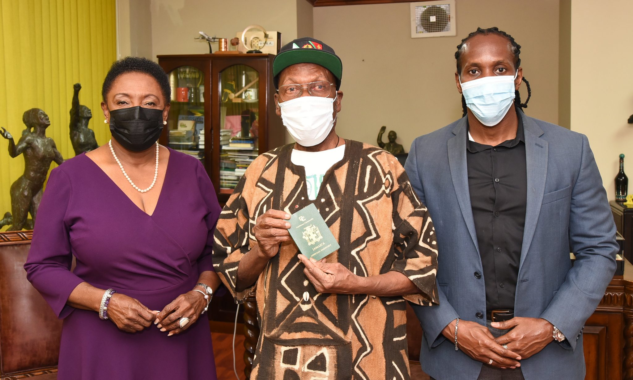 PHOTOS: Minister Grange Presents Official Passport to Jimmy Cliff