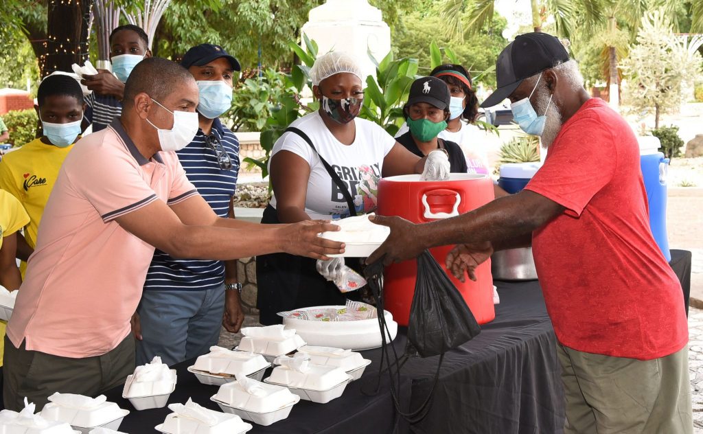 Correctional Officer Feeds The Poor - Jamaica Information Service