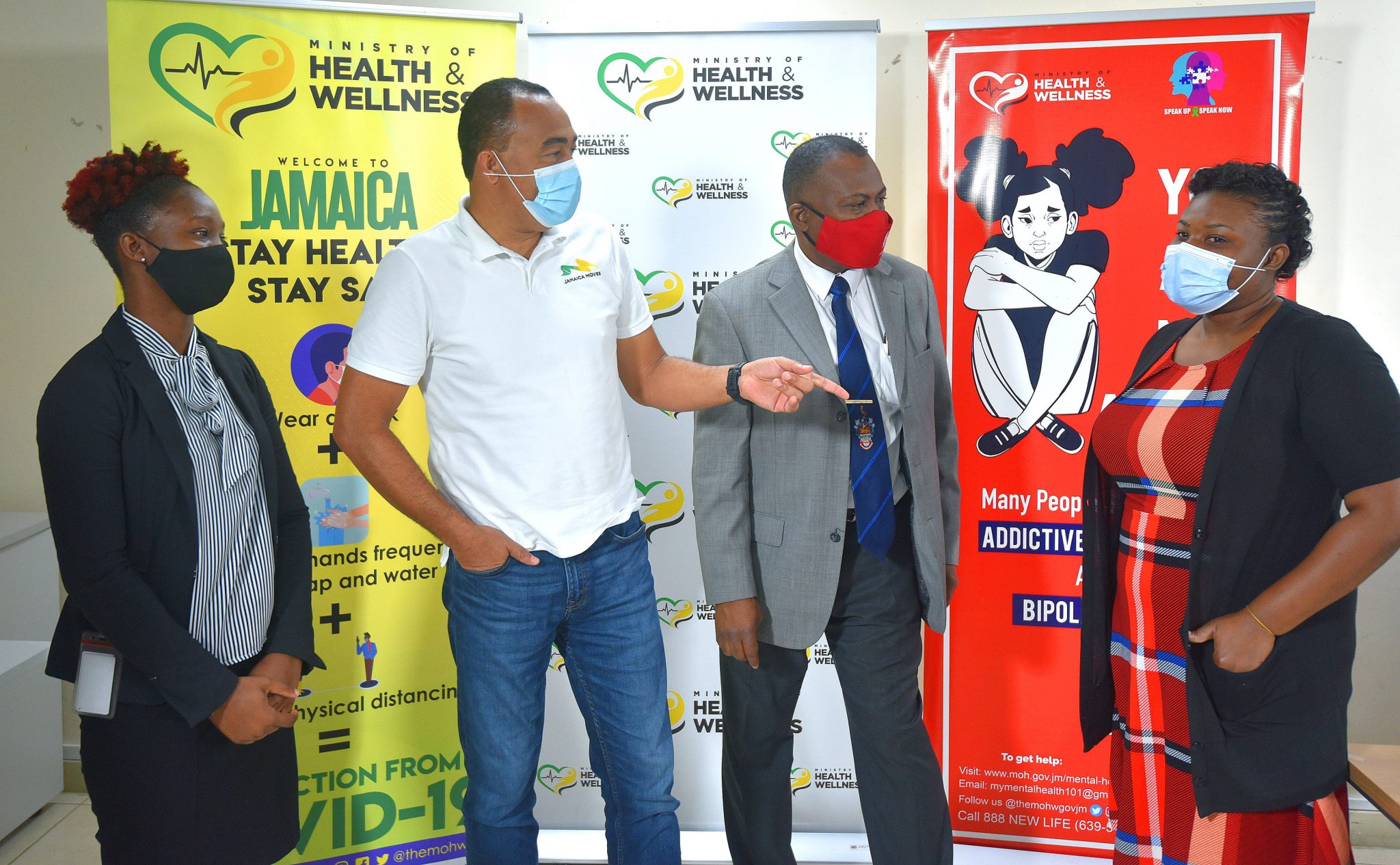 Minister of Health and Wellness, Dr. the Hon. Christopher Tufton (2nd left), in discussion with Ann Marie Mowatt Carby (right), one of 30 persons who have joined the Ministry