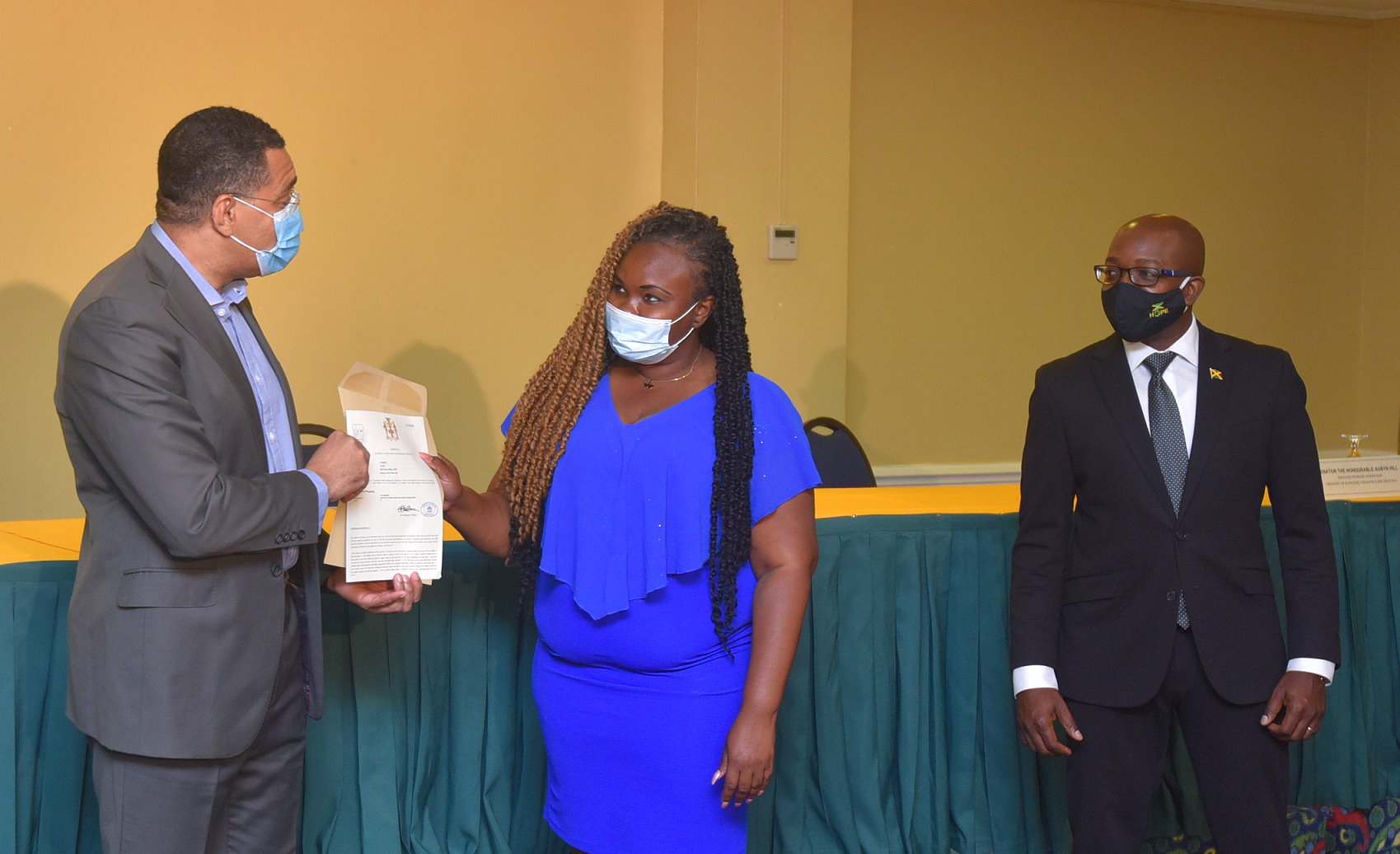 Prime Minister Presents Land Titles To 33 Persons