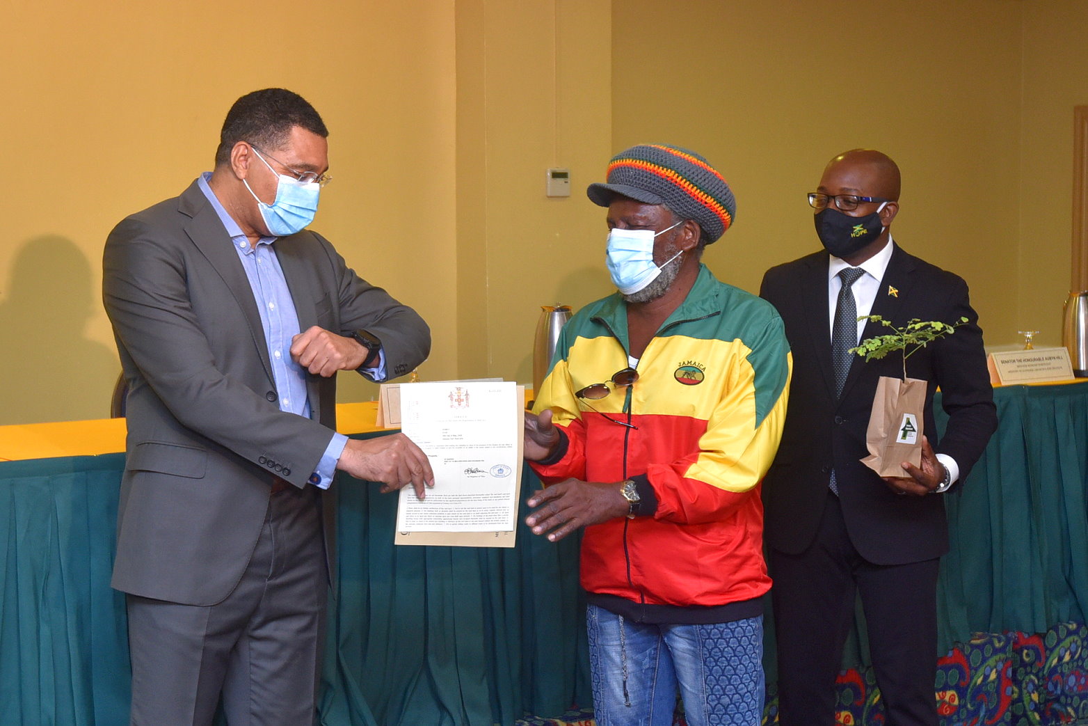 Prime Minister Presents Land Titles To 33 Persons