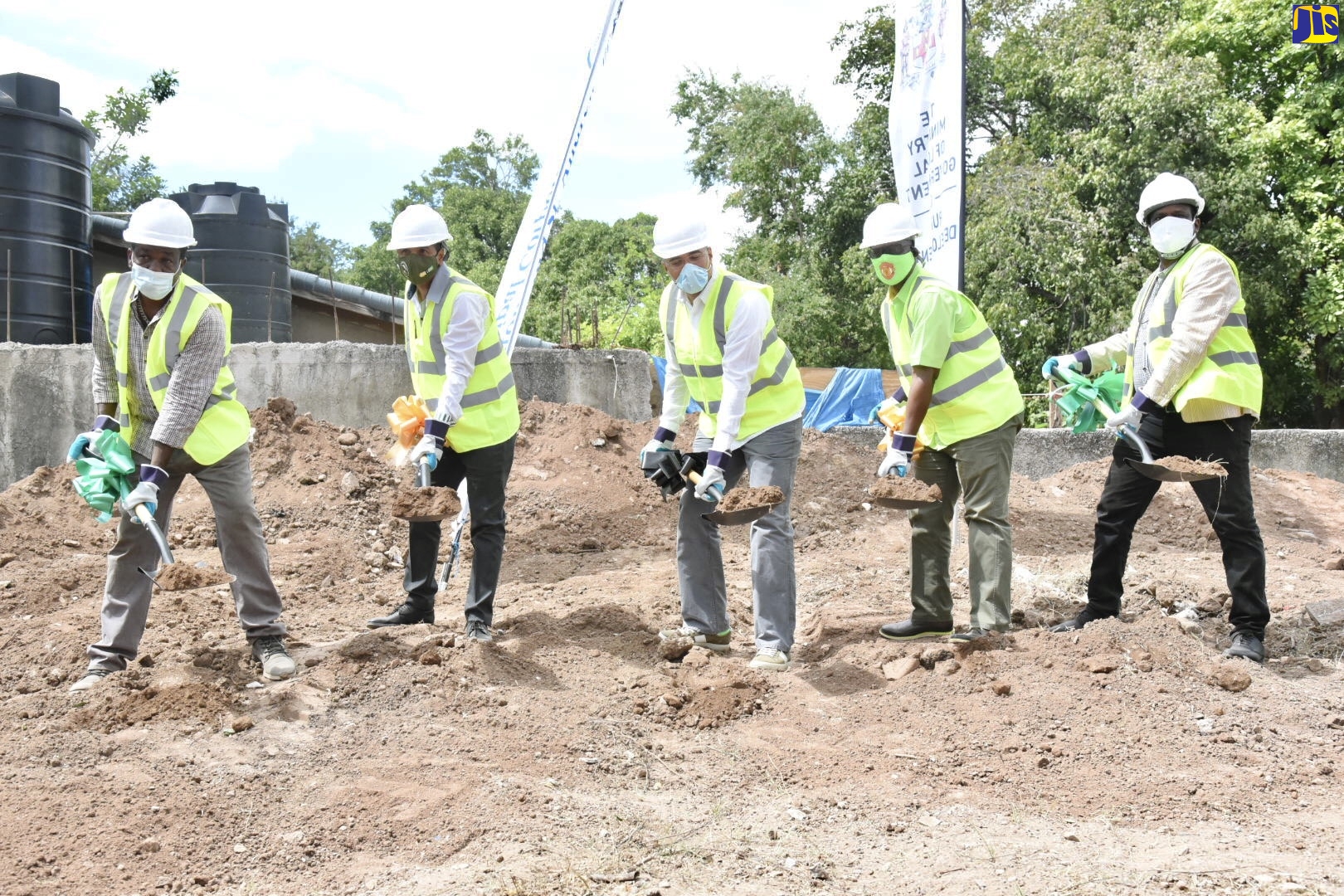Prime Minister, the Most Hon. Andrew Holness (centre); and Minister of Local Government and Rural Development, Hon. Desmond McKenzie (second right), break ground for the construction of  the Andrews Mews Health and Recreational Centre, in Olympic Gardens, St. Andrew on Friday (February 19). Also participating (from left), are: Councillor Caretaker, Molynes Gardens Division, Glendon Salmon; Mayor of Kingston, Senator Councillor, Delroy Williams; and Councillor for the Molynes Gardens Division, Patrick Roberts. The facility, which is being constructed at a cost of $16 million, is located in the Prime Minister’s West Central St. Andrew constituency.