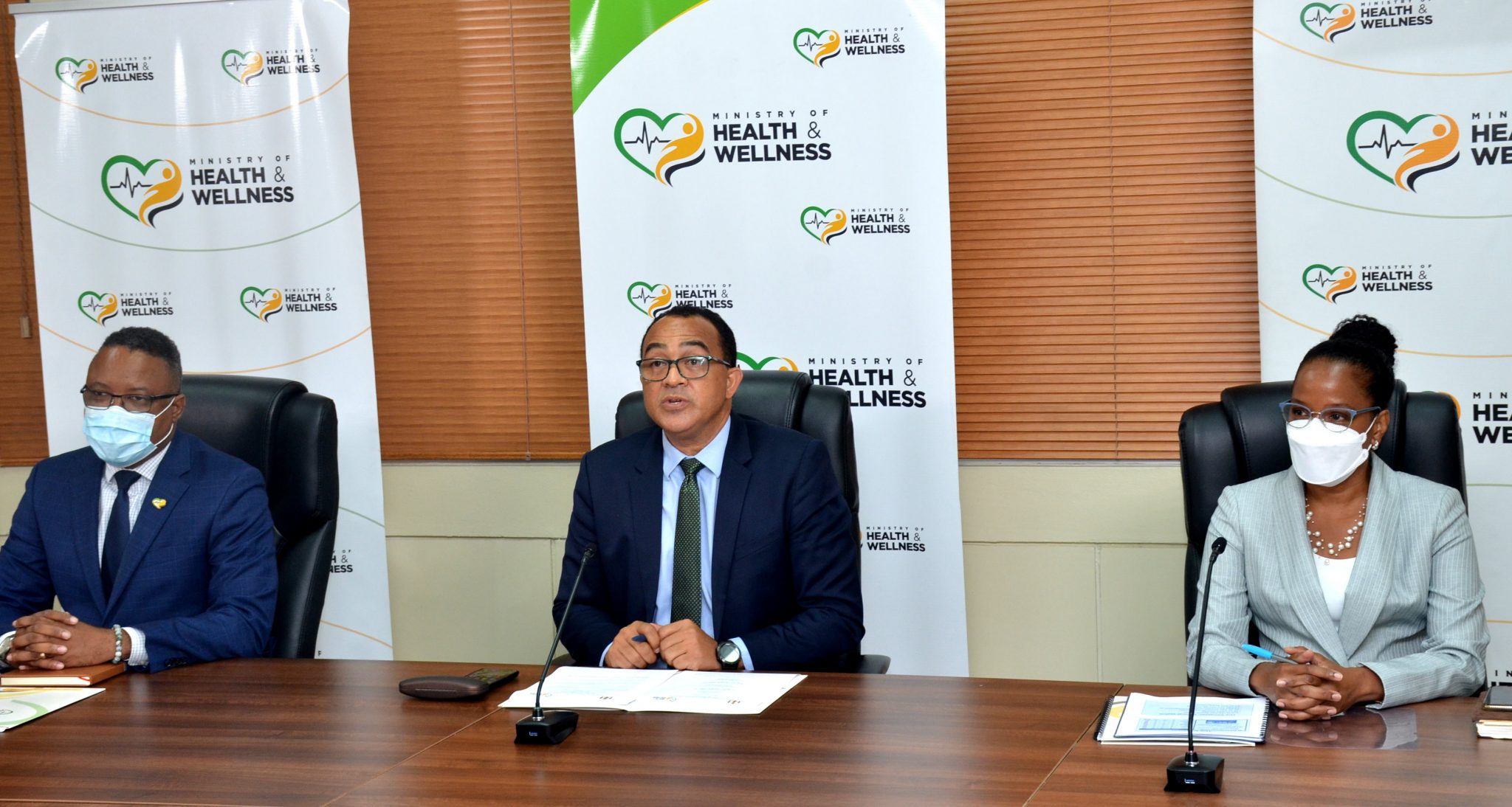Minister of Health and Wellness, Dr. the Hon. Christopher Tufton, addressing the virtual COVID Conversations press conference on February 18. Others (from left) are Permanent Secretary in the Ministry, Dunstan Bryan, and National Epidemiologist, Dr. Karen Webster Kerr.

