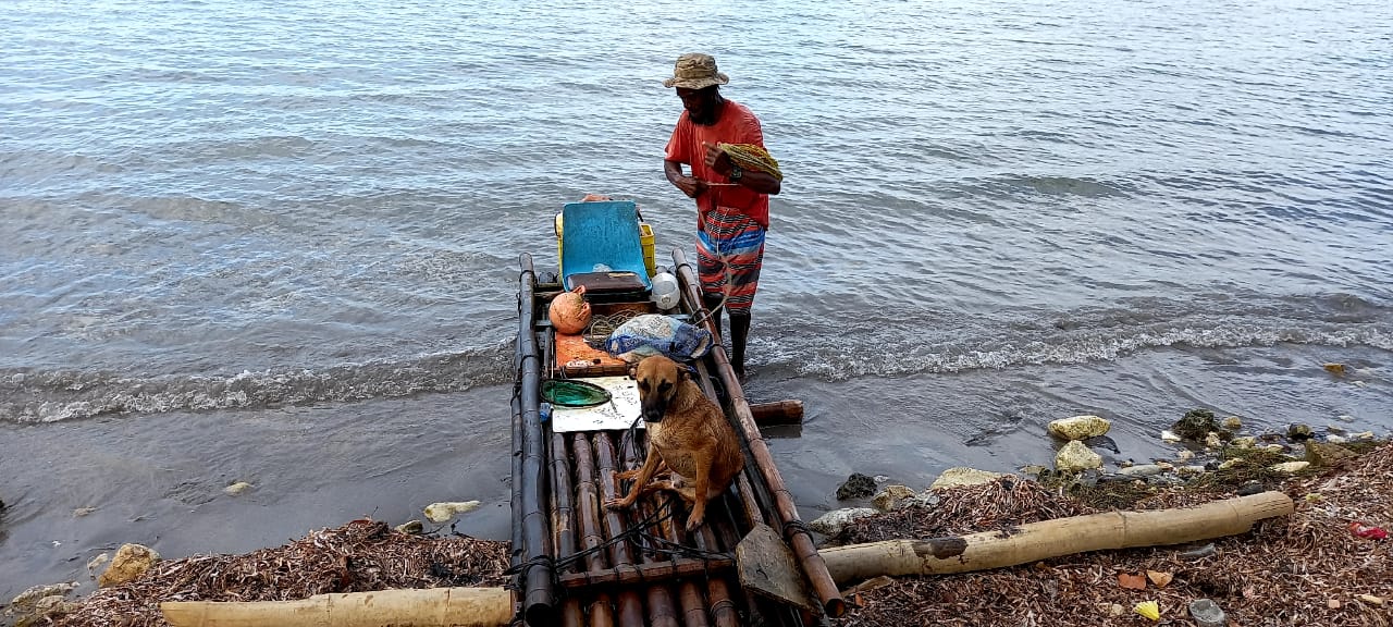 Portland Fisherman, Kenneth Hanse, returning from sea in the coastal district of Bryan’s Bay, Port Antonio.

