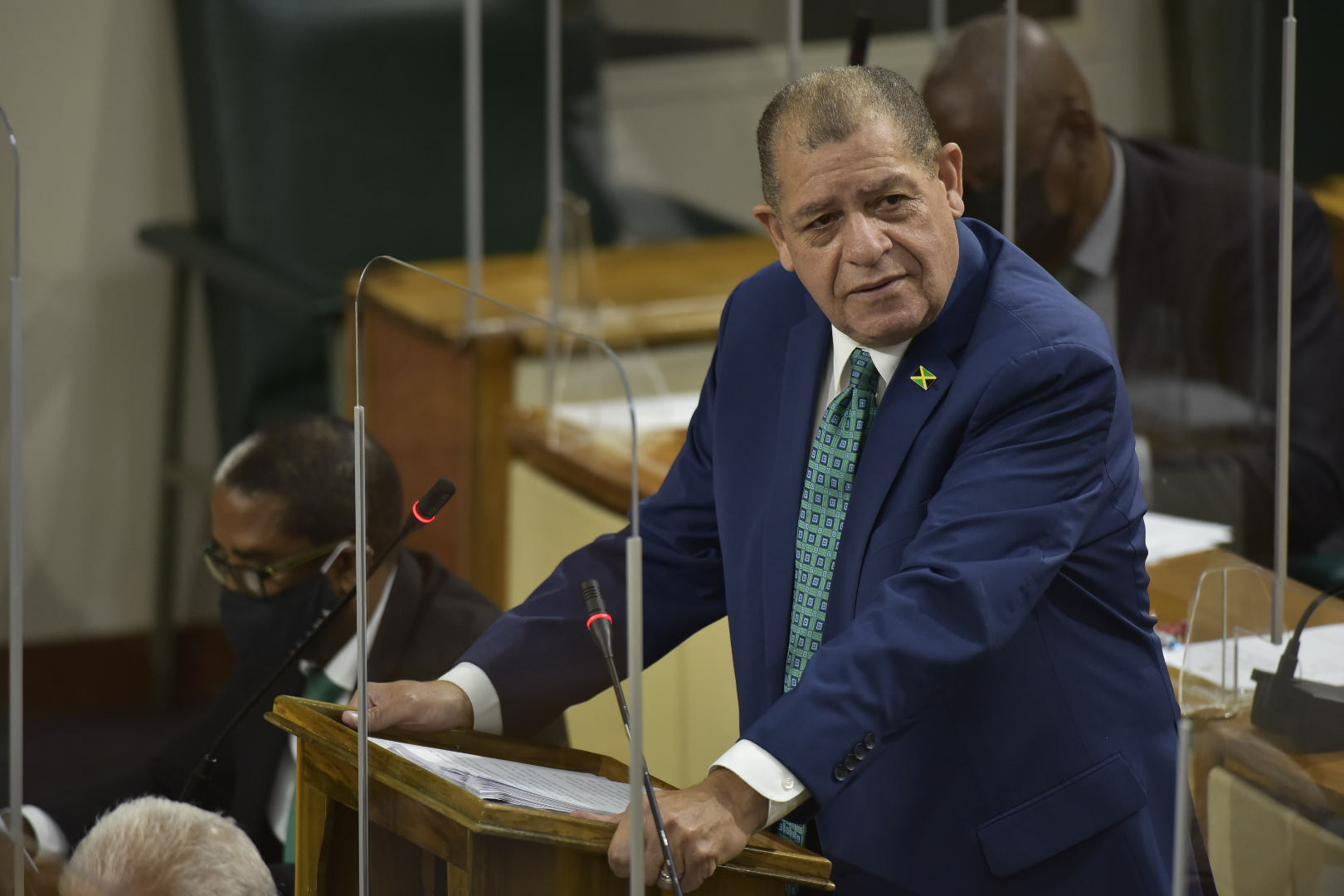 Minister of Industry, Investment and Commerce, Hon. Audley Shaw, speaks in the 2021/22 Sectoral Debate in the House of Representatives, on May 11. Seated at left is Minister of State in the Ministry of Industry, Investment and Commerce, Dr. the Hon. Norman Dunn.

