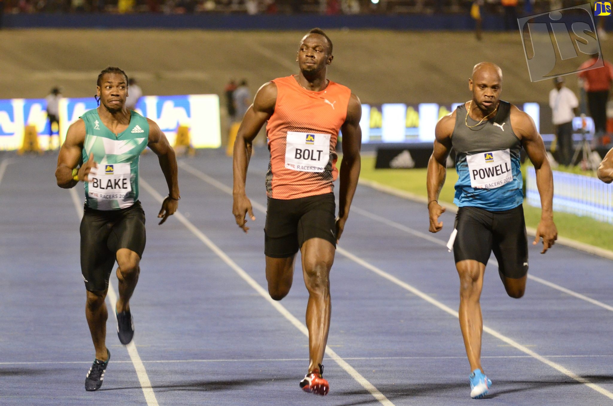Jamaica's sprint champions Yohan Blake (left), Usain Bolt (centre) and Asafa Powell, participate in a race at the National Stadium in Kingston.