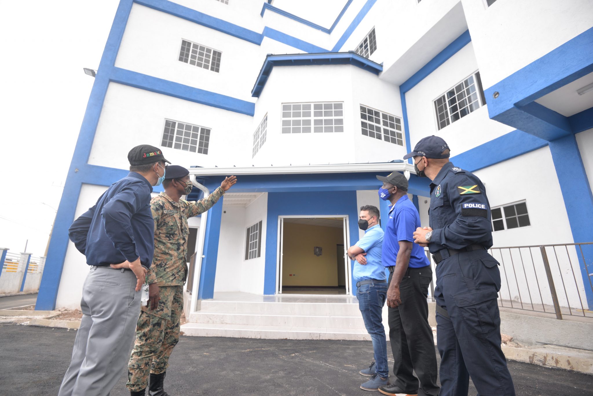 (From left): Minister of National Security, the Hon. Dr. Horace Chang; Staff Sergeant H. Powell, Engineer Regiment, Jamaica Defence Force (JDF); Minister Without Portfolio in the Ministry of National Security, Senator the Hon. Matthew Samuda; Permanent Secretary, Ministry of National Security, Courtney Williams and Commissioner of Police, Major General Antony Anderson, view the newly constructed Olympic Gardens Police Station in St. Andrew, during a tour of the facility on May 15.