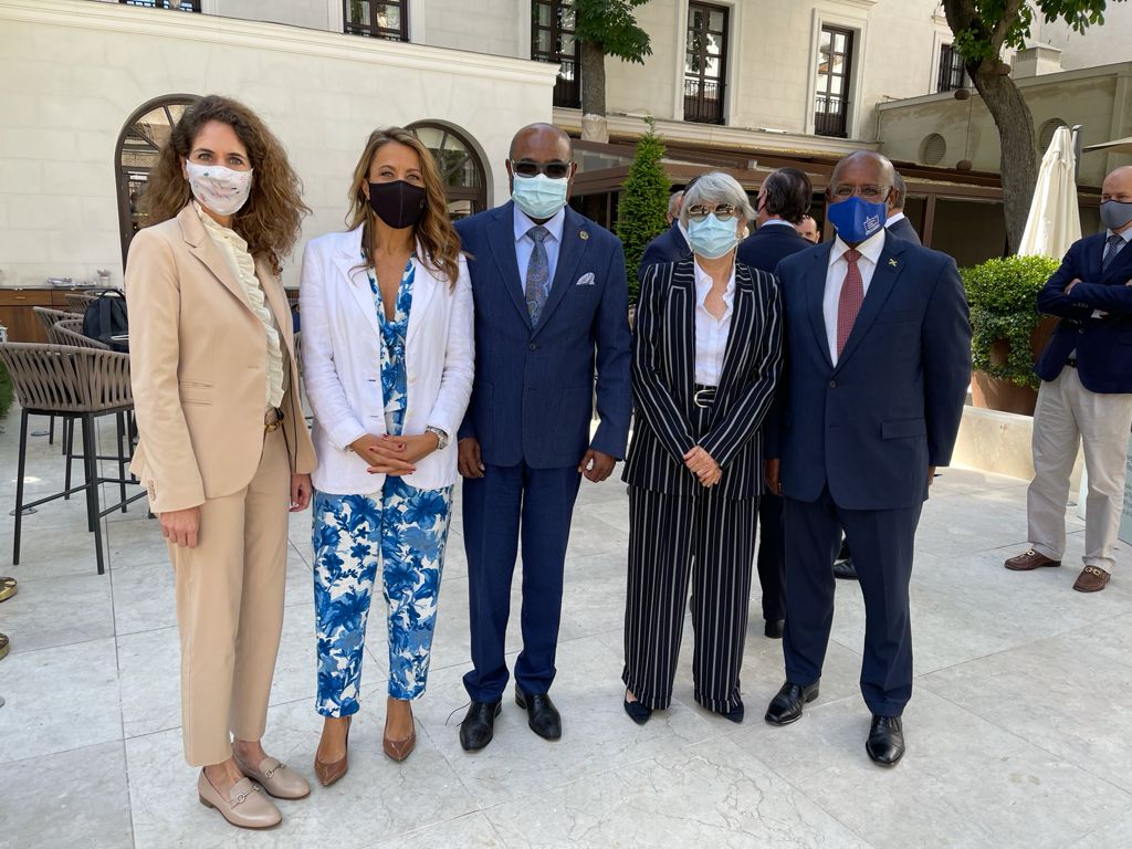 Tourism Minister, Hon. Edmund Bartlett (centre) and Minister without Portfolio in the Ministry of Economic Growth and Job Creation,  Senator the Hon. Aubyn Hill (right),  with three of the most powerful women in the global tourism industry (from left): CEO of Iberostar Hotels & Resorts, Sabina Fluxà; Executive Vice President and CEO of Grupo Piñero,  Encarna Piñero,  and owner and CEO of the RIU Hotels & Resorts chain, Carmen Riu Güell. The group discussed possible investment opportunities during their meeting at the FITUR tourism tradeshow, in Madrid, Spain, recently.

