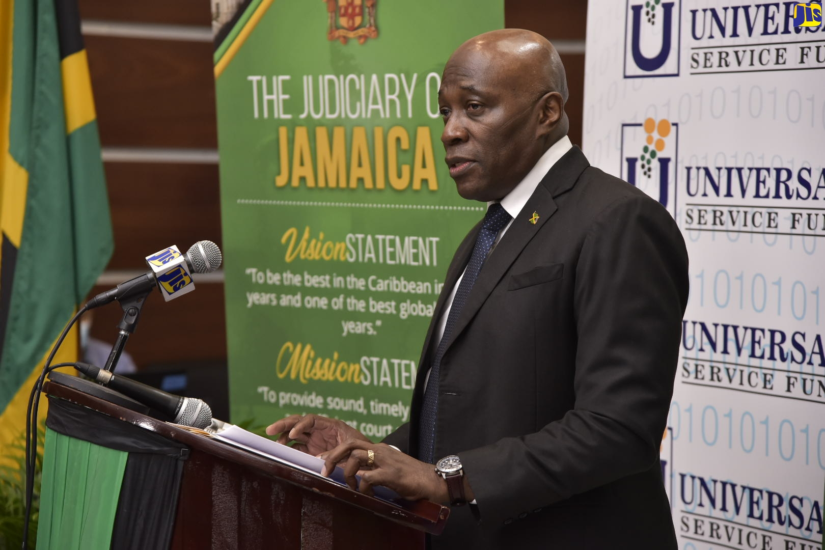 Chief Justice, Bryan Sykes, addresses the contract-signing ceremony between Universal Service Fund (USF) and the Court Administration Division (CAD) for the provision of $20 million for the procurement of information and communications technology (ICT) equipment for courts. The function was held on Thursday (June 3)  at the Supreme Court, downtown Kingston.

 