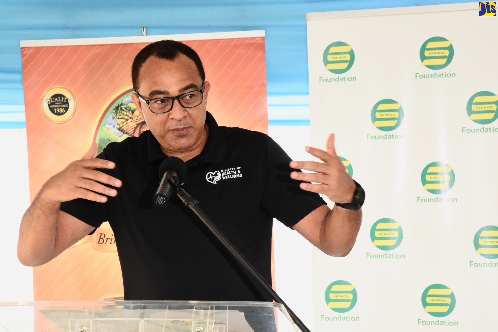 Minister of Health and Wellness, Dr. the Hon. Christopher Tufton, addresses ceremony for the adoption of the Seaforth Health Centre in St. Thomas, by the Seprod Foundation and Canco Ltd. The event was held at the centre on June 17.
