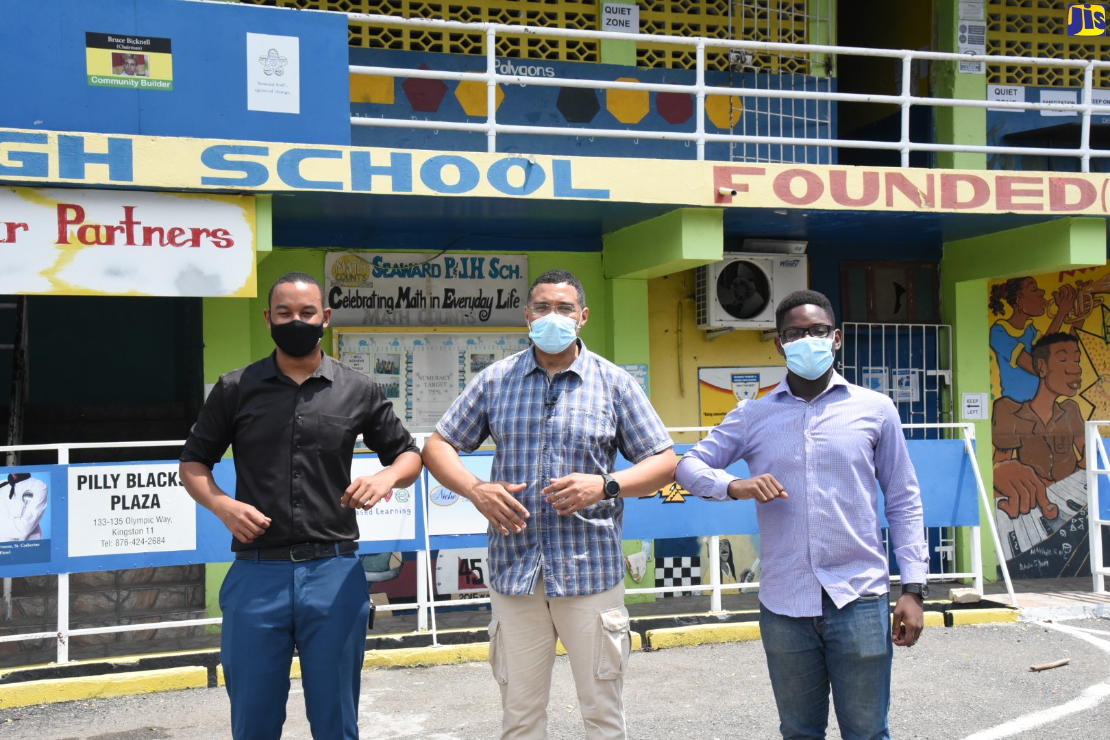 Prime Minister and Member of Parliament for West Central St. Andrew, the Most Hon. Andrew Holness (centre), with President of non-profit organisation, Jamaica Millennium Vision for Youth (JMVY), Chad Rattray (left), and Vice President, Akkeem Polack, at Seaward Drive Primary School on Saturday (June 26). The Prime Minister was visiting students who participated in special ‘super classes’ facilitated at the institution on Saturday (June 26) by JMVY for 2021 Caribbean Secondary Education Certificate (CSEC) and Caribbean Advanced Proficiency Examination (CAPE) external test candidates.