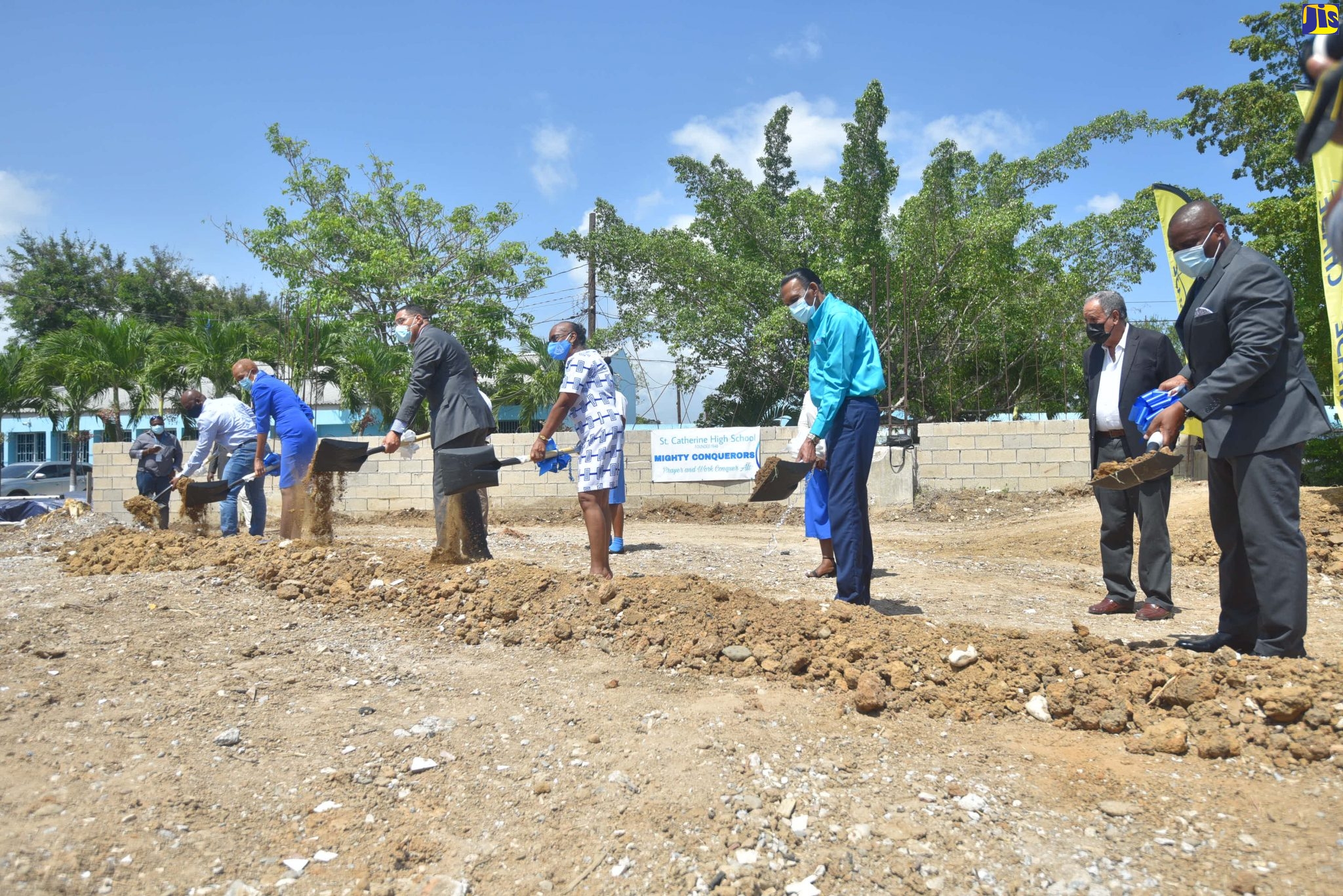 Prime Minister, the Most Hon. Andrew Holness (third left),  breaks ground for the construction of a new performing arts centre at St. Catherine High School, on Friday (June 18). Also participating (from left) are: Member of Parliament, St. Catherine South Central, Dr. Andrew Wheatley; Minister of Education, Youth and Information, Hon. Fayval Williams; Chairman, St. Catherine High School Board, Ms. Sharon Dale; Chief Executive Officer, CHASE Fund, Billy Heaven, and Principal, St. Catherine High School, Mr. Marlon Campbell.