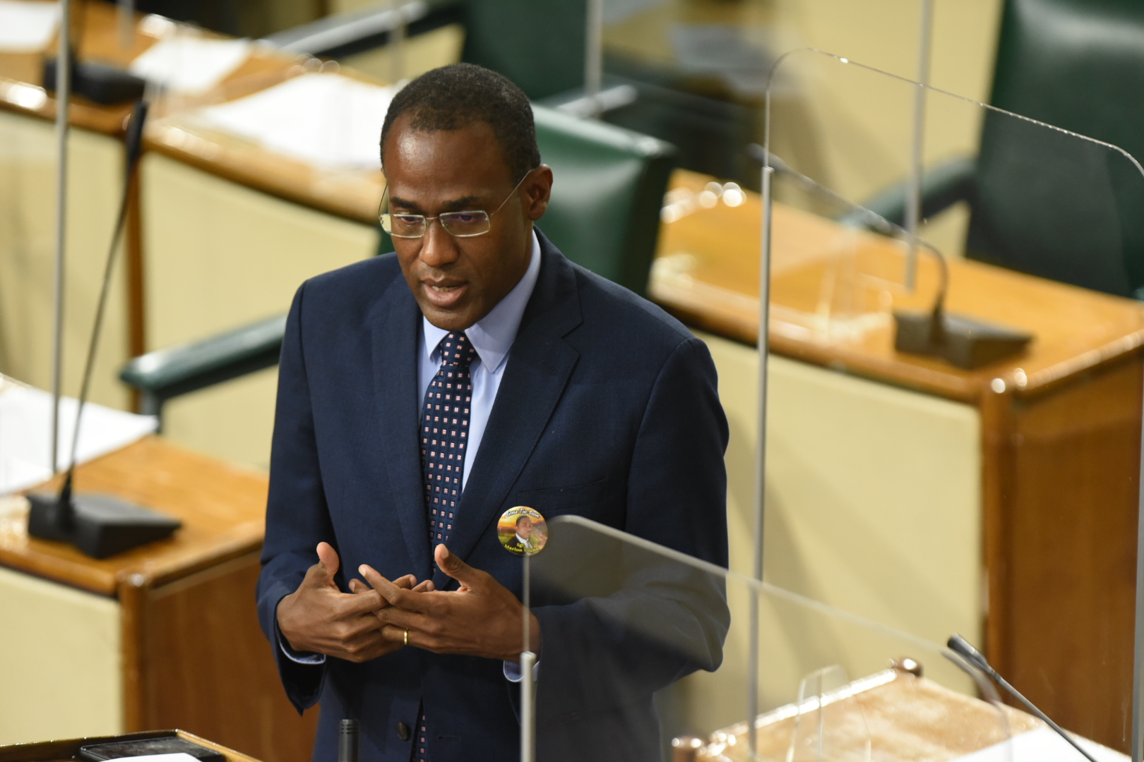 Minister of Finance and the Public Service, Dr. the Hon. Nigel Clarke, explains an aspect of the Casino Gaming (Amendment) Act, 2021, while piloting the Bill in the House of Representatives on Tuesday (June 29).