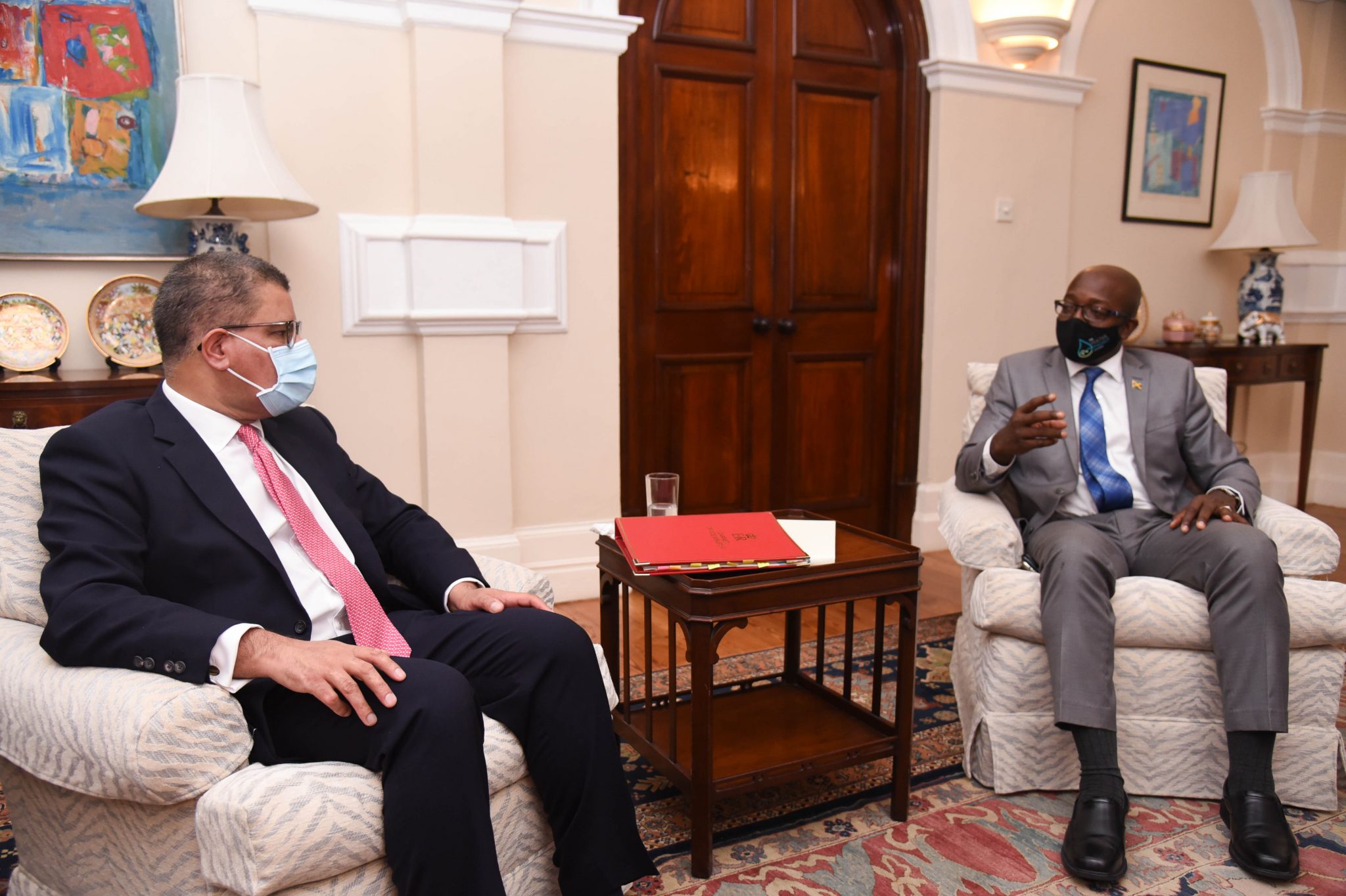 Minister of Housing, Urban Renewal, Environment and Climate Change, Hon. Pearnel Charles Jr. (right), converses with President-designate of the Conference of Parties to the United Nations Framework Convention on Climate Change,  the Rt. Hon. Alok Sharma, during a recent meeting at the British High Commission in St. Andrew.

