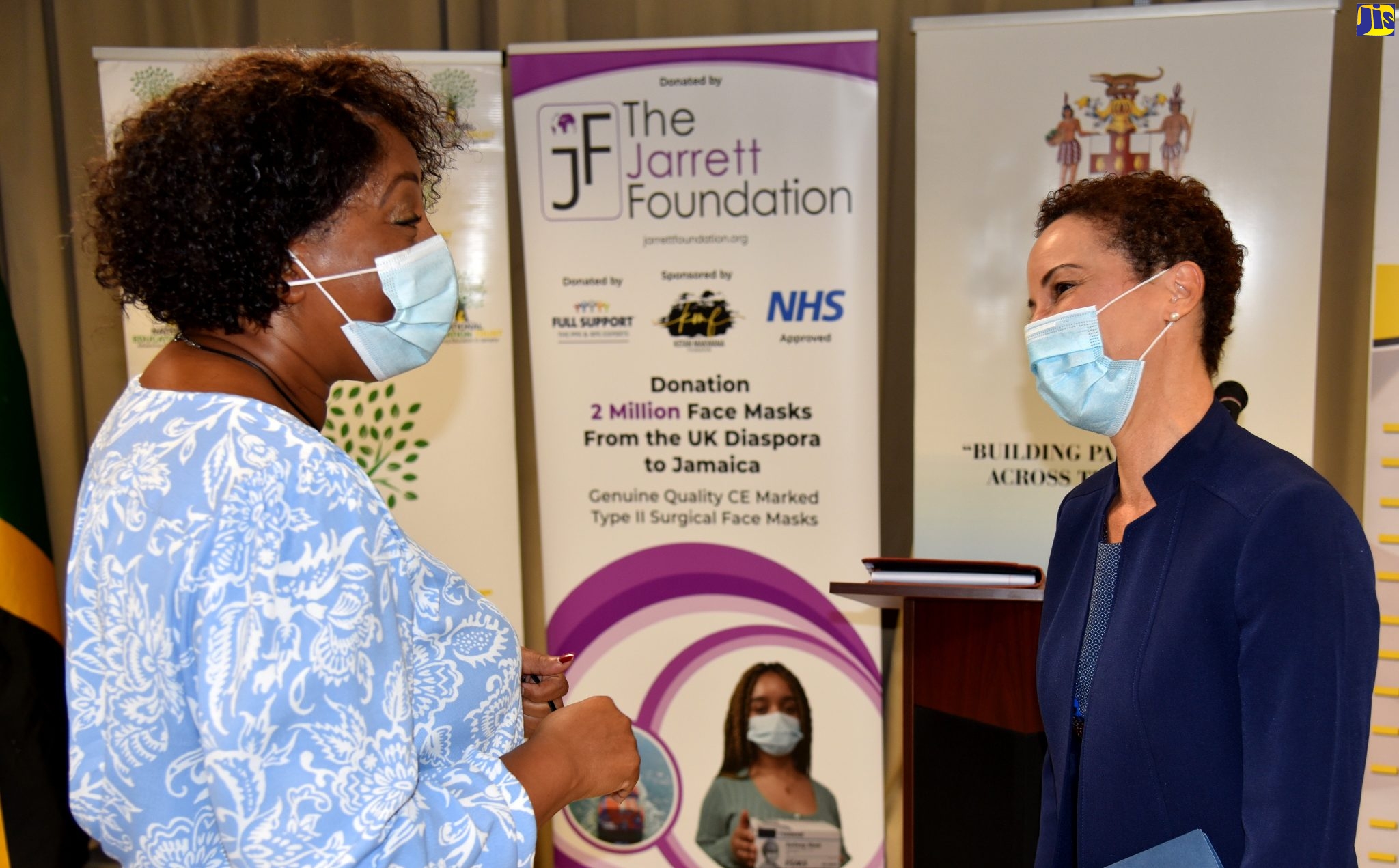 Minister of Foreign Affairs and Foreign Trade, Senator the Hon. Kamina Johnson Smith (right), in discussion with Chief Executive Officer of the Jarrett Foundation, Dr. Pearl Jarrett, at a ceremony held on Thursday (July 15) at the new Foreign Affairs headquarters, 2 Port Royal Street, Downtown Kingston, to hand over two million face masks.