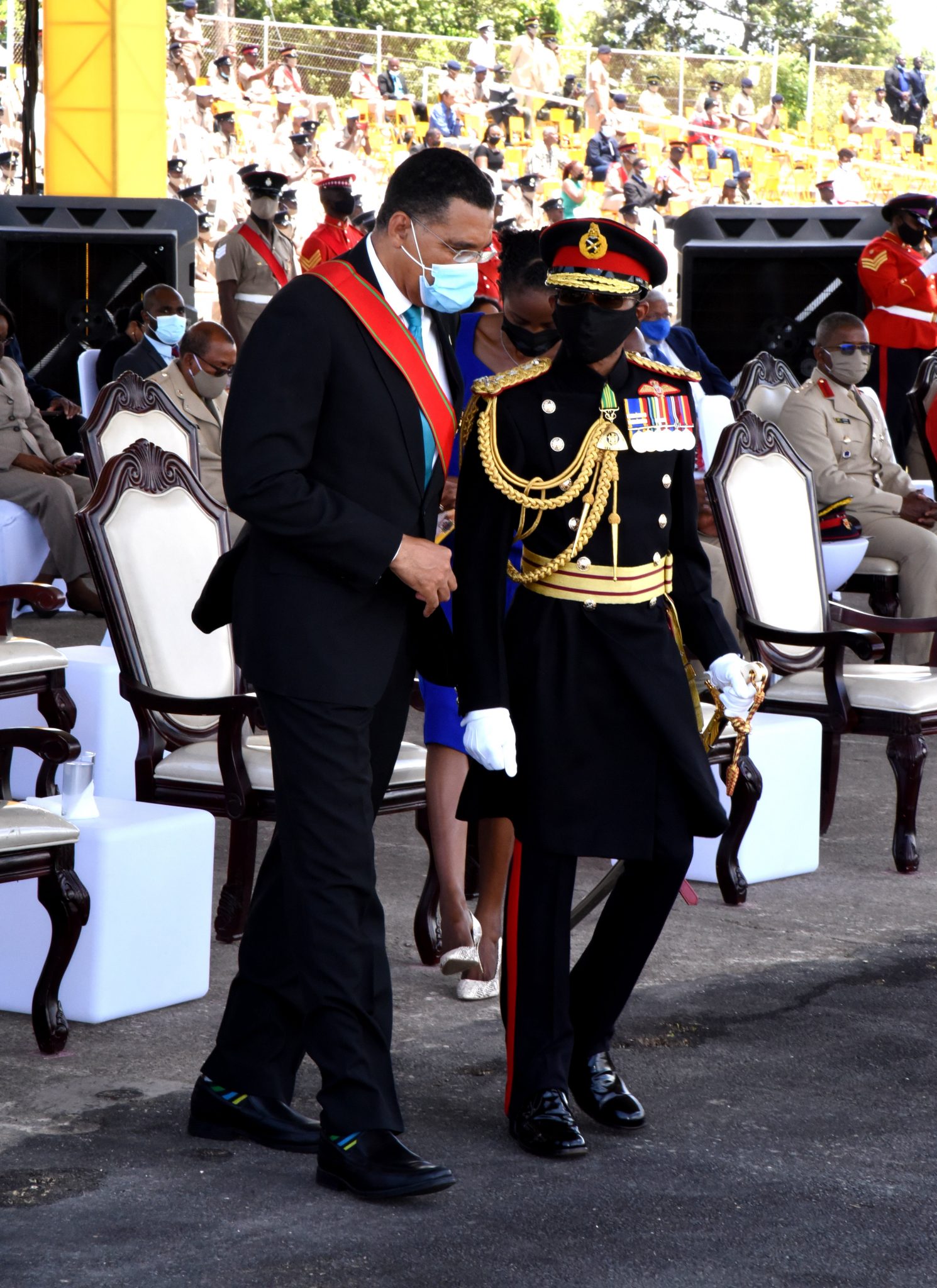 Prime Minister and Minister of Defence, the Most Hon. Andrew Holness (left), converses with Chief of Defence Staff, Lt. General Rocky Meade, during the Jamaica Defence Force (JDF) Armed Forces Day Parade on Friday (July 30) at Up Park Camp, Kingston.


