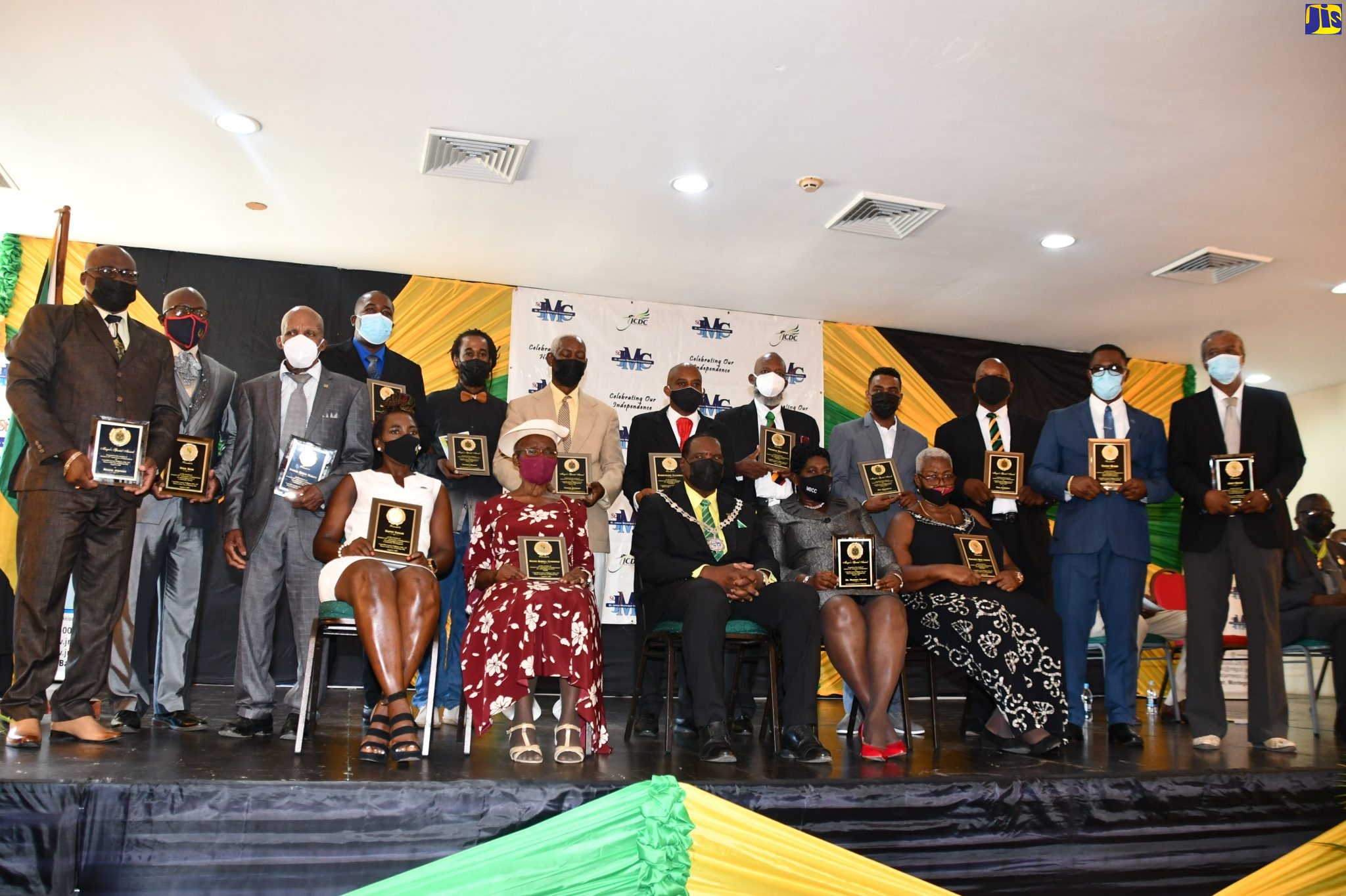  Mayor of Montego Bay, Councillor Leeroy Williams (seated, centre, front row), is flanked by citizens who received the St. James Municipal Corporation Spirit of Independence and Mayor’s Special Awards, during the municipality’s Independence Day Flag Raising and Civic Ceremony, which was held at the Montego Bay Cultural Centre on Friday (August 6).