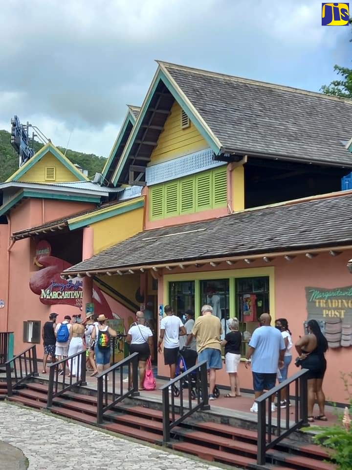 Guests from the Carnival Sunrise seen trekking into the popular Margaritaville attraction at the Island Village complex in Ocho Rios, St. Ann, on August 25.