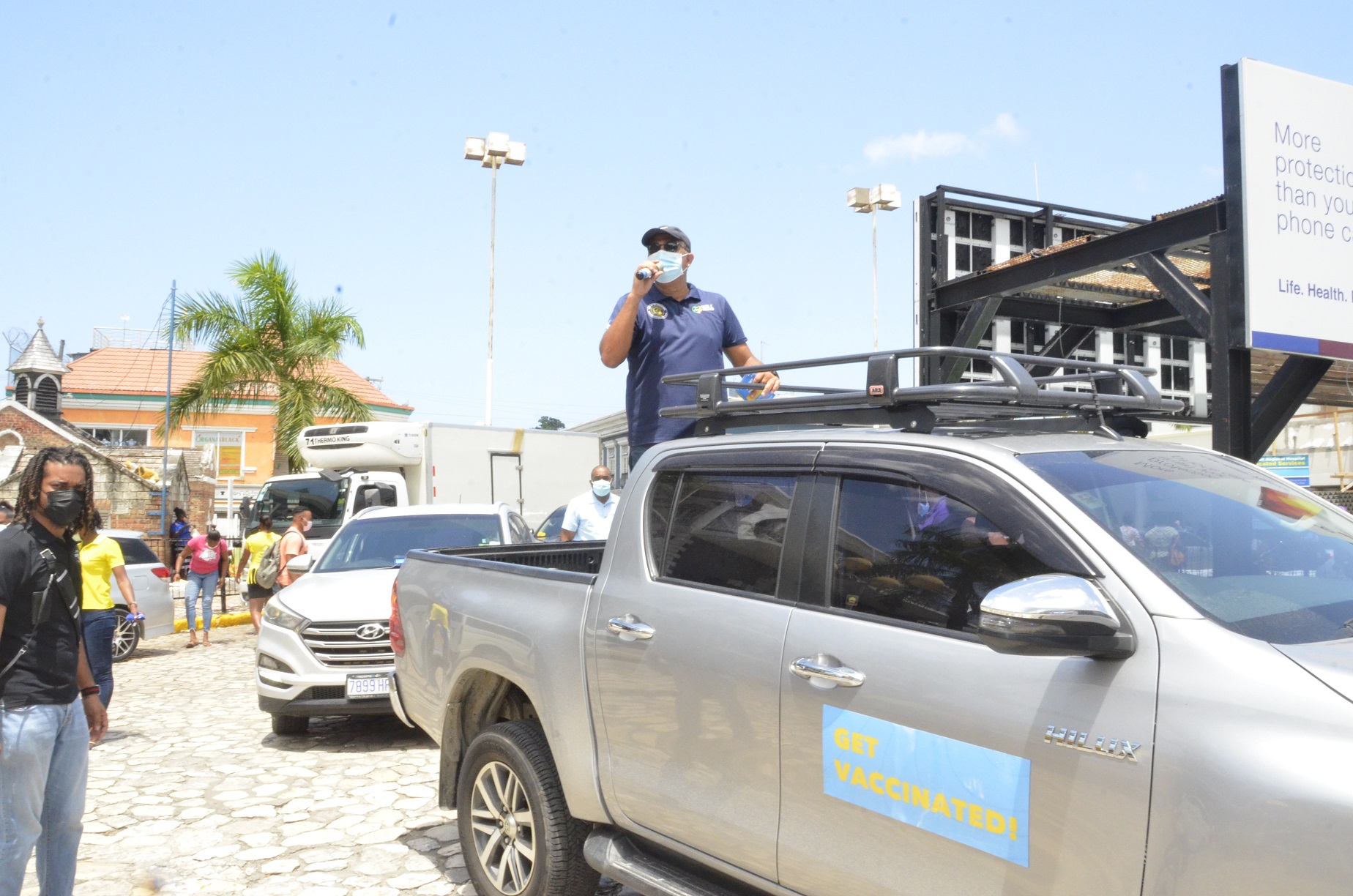 Minister of Health and Wellness, Dr. the Hon. Christopher Tufton, leads a vaccination motorcade in Sam Sharpe Square in Montego Bay, St. James, on Wednesday, September 8. He also  visited vaccination sites and engaged in community sensitisation sessions throughout the parish.

 
