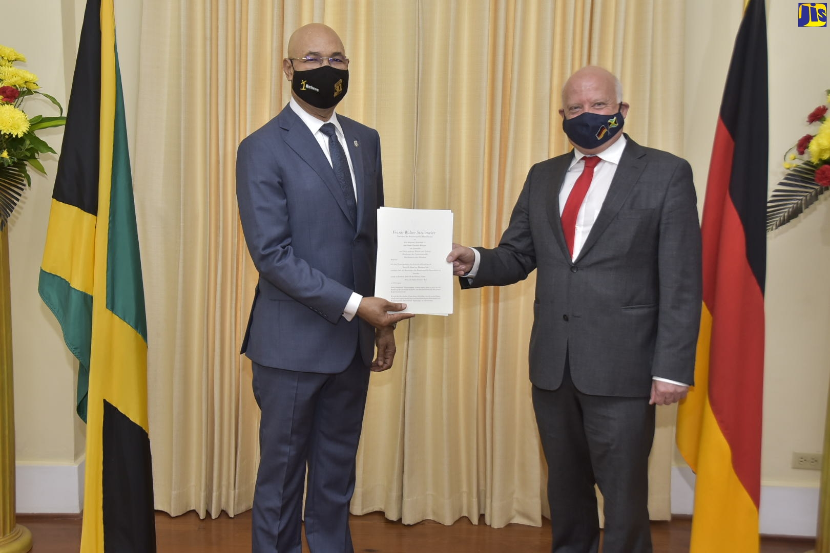 Governor-General, His Excellency, the Most Hon. Sir Patrick Allen (left,) accepts Letters of Credence from Ambassador-designate of the Federal Republic of Germany to Jamaica, His Excellency Dr. Stefan Freidrich Keil, during a ceremony at King