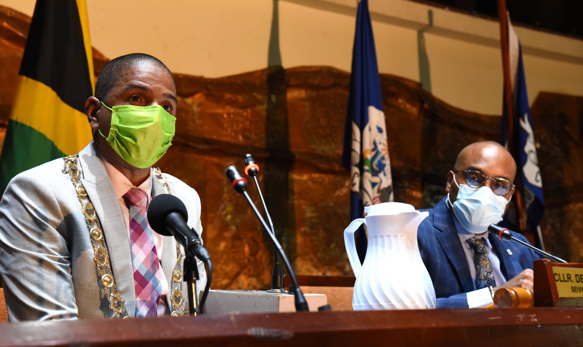 Mayor of Kingston, Senator Councillor Delroy Williams (left), addresses the Kingston and St. Andrew Municipal Corporation (KSAMC) monthly meeting held on Wednesday (September 22) at the Jamaica Conference Centre, downtown Kingston. Also pictured is Chief Executive Officer of the KSAMC, Robert Hill.

