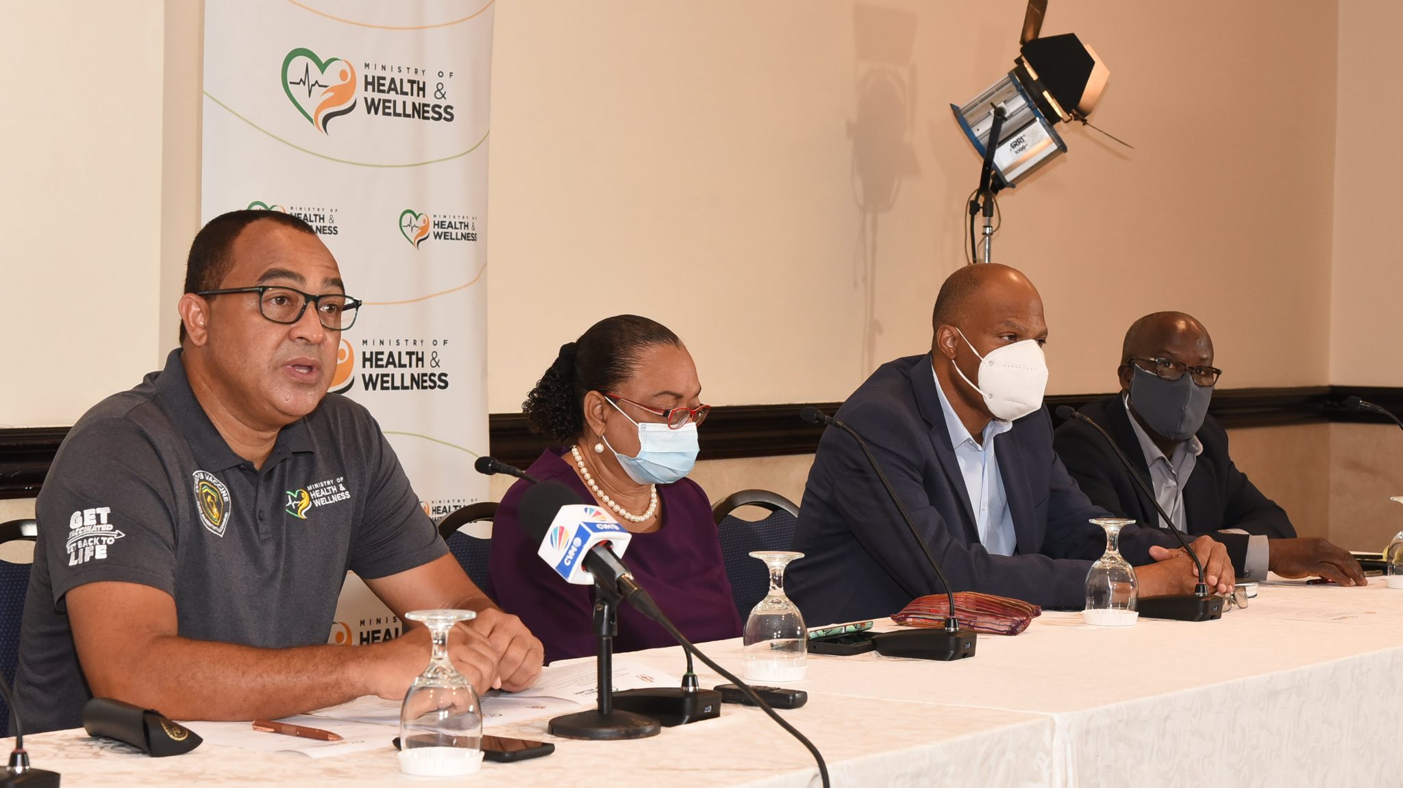 Minister of Health and Wellness, Dr. the Hon. Christopher Tufton (left), provides an update on the Government’s coronavirus) COVID-19 Vaccination Implementation Programme, during a  press conference at The Jamaica Pegasus hotel in New Kingston, on Friday (September 10). The press conference was attended by executives of the Jamaica Confederation of Trade unions (JCTU), who endorsed the initiative. They are (from second left) President, and Jamaica Association of Local Government Officers (JALGO) General Secretary, Helene Davis Whyte; Vice President, and Union of Technical, Administrative and Supervisory Personnel (UTASP) General Secretary, St. Patrice Ennis; and Assistant General Secretary, and University and Allied Workers Union (UAWU) Vice President, Clifton Grant.

