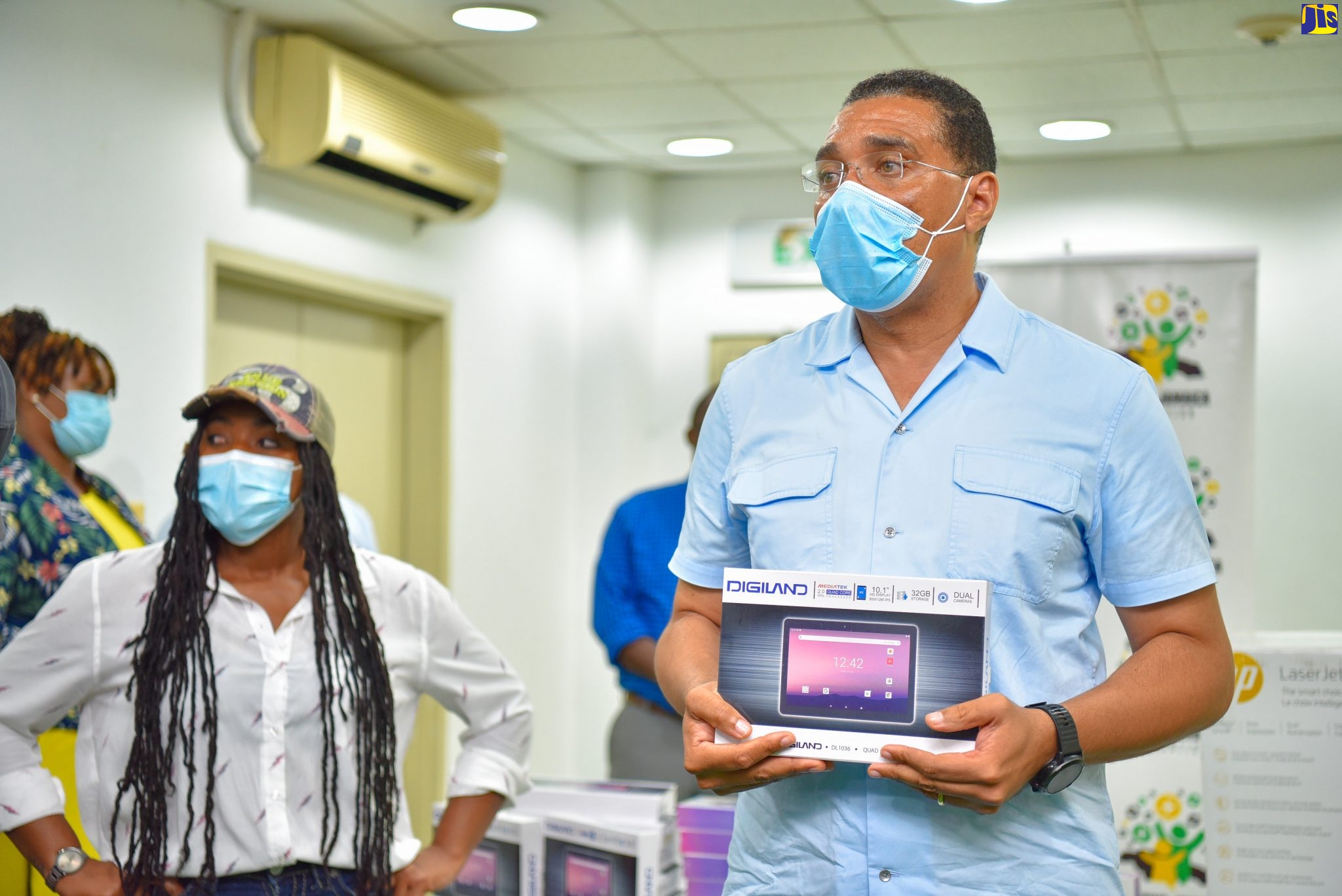 Prime Minister Hands over Tablets in Trelawny