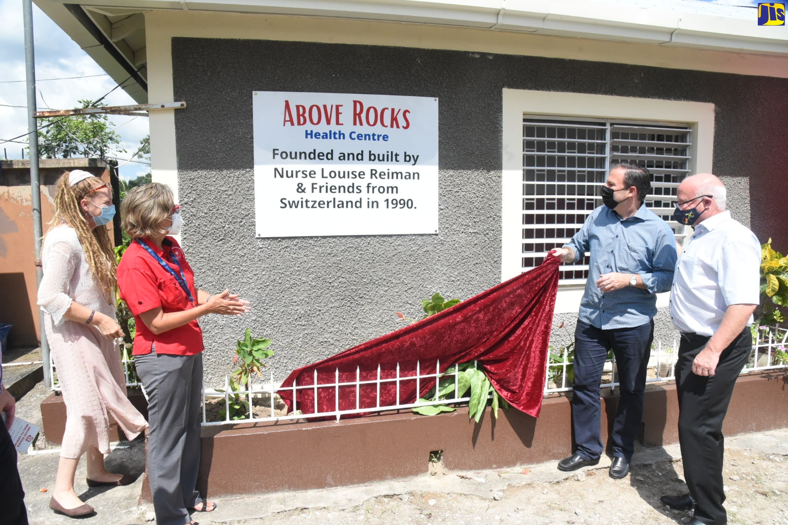 Executive Director at the Heart Foundation of Jamaica (HFJ), Deborah Chen (second left), celebrates the official handover of the Above Rocks Health Cenrte, in St. Catherine, yesterday (October 27), following the $2.7-million upgrading, funded by the German Government and the Charitable group, VFKE (Verein zur Forderung von Kleimprojekten). Others (from left) are nurse at the facility, Johanna Burgher; Swiss Honorary Consul General to Jamaica, Ueli Bangerter, and Ambassador designate for the Federal Republic of Germany to Jamaica, His Excellency, Dr. Stefan Freidrich Keil.