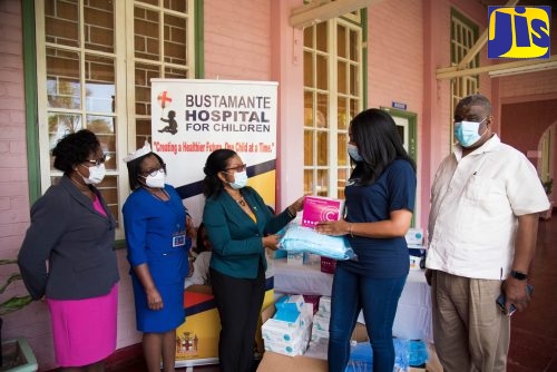 Senior Medical Officer at the Bustamante Hospital for Children, Dr. Michelle-Ann Richards-Dawson (third left), receives medical items from Country Representative, Diaspora for Children Foundation Kimberly Nain (second right). Occasion was a recent hand over of the items at the Hospital, in St. Andrew. Others pictured from left are: Chief Executive Officer of the institution Camile Wallen-Panton, Director of Nursing Services Beverley Senior-Berry, and Regional Director at the South East Regional Health Authority (SERHA) Errol Greene. The Foundation is a US-based non-profit group focused on child development. They recently donated over 500 bag packs, books, school uniforms, pencils and sharpeners to Kensington Primary, York Town Primary, Highgate Primary, Rock River All Age and New Forest Primary Schools. Photo: Adrian Walker