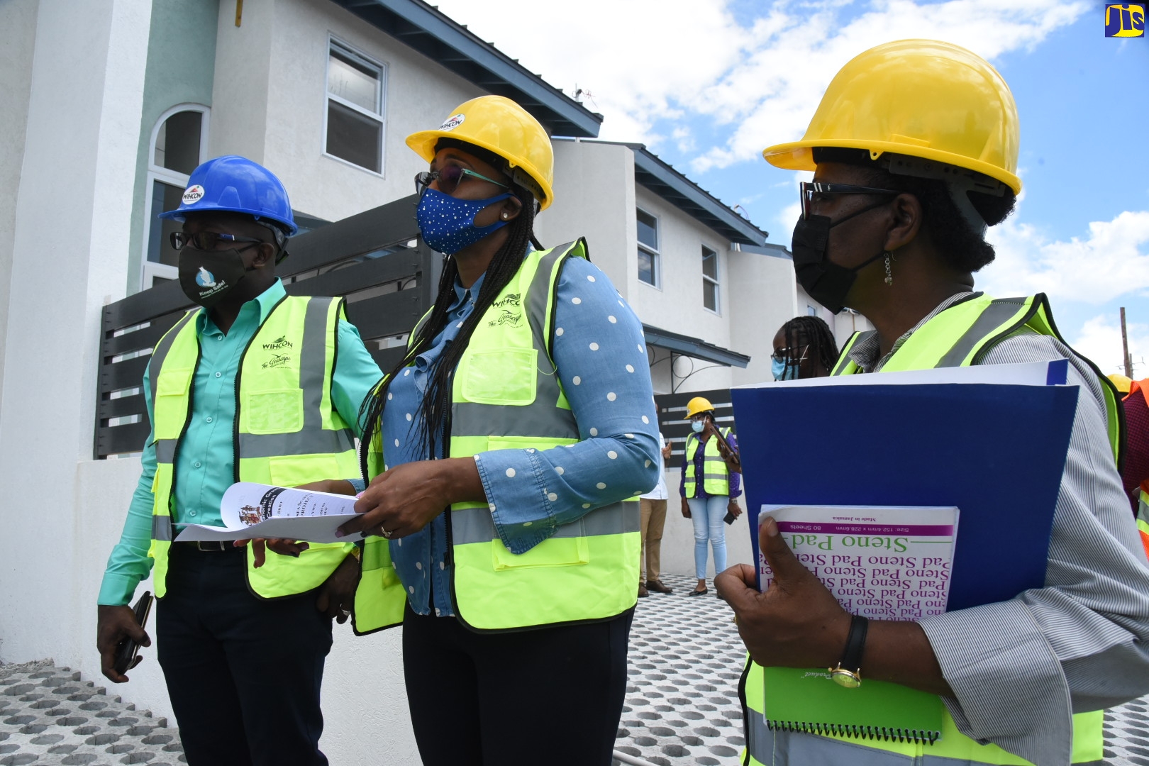 Minister of Housing, Urban Renewal, Environment and Climate Change (MHURECC) Hon. Pearnel Charles Jr (left) views the Harbour Head Seascape Development with Member of Parliament for East Rural St. Andrew, the Most Hon. Juliet Holness (center) and Chief Technical Director in MHURECC, Mrs. Doreen Prendergast on October 1. 