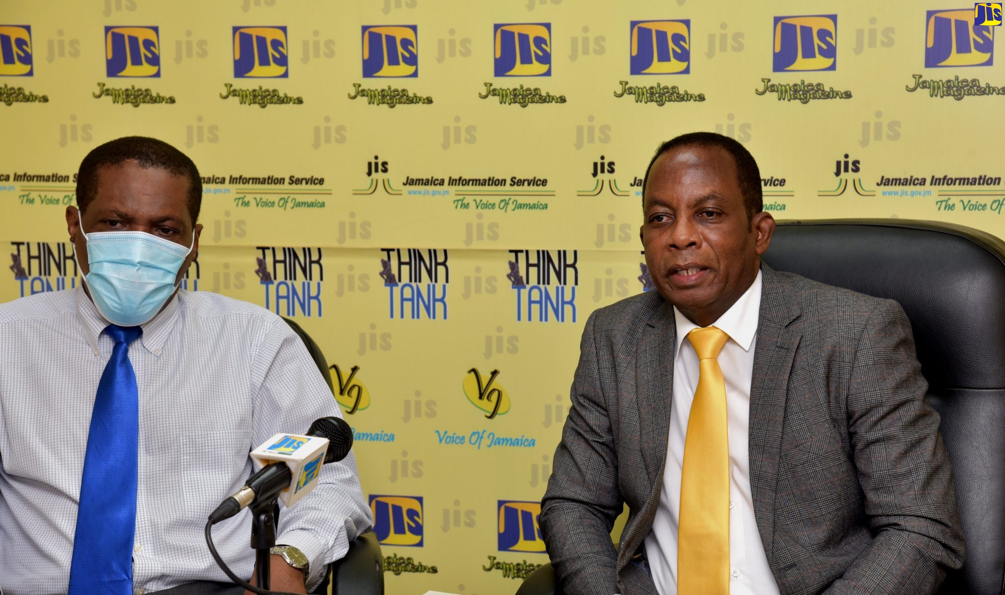 Director of Elections, Glasspole Brown (right), addresses a recent Jamaica Information Service (JIS) Think Tank, while Deputy Director of Elections with responsibility for Field Operations, Earl Simpson (left) listens on. The Think Tank was held at the JIS head office in Kingston.