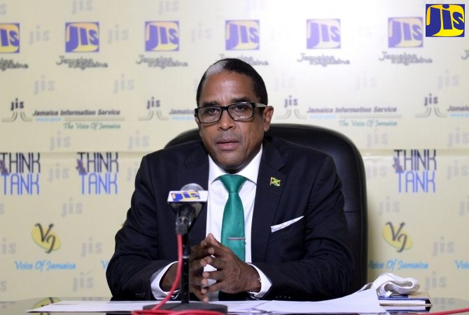 Minister of State in the Ministry of Industry, Investment and Commerce, Dr. the Hon. Norman Dunn.