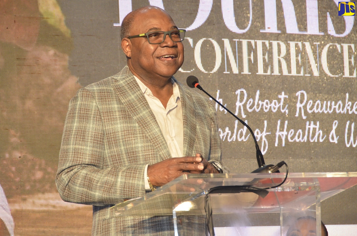 Tourism Minister Hon Edmund Bartlett delivers the keynote address at the opening of the third annual Jamaica Health and Wellness Tourism Conference at the Montego Bay Convention Centre, St. James, on Thursday (November 18).  