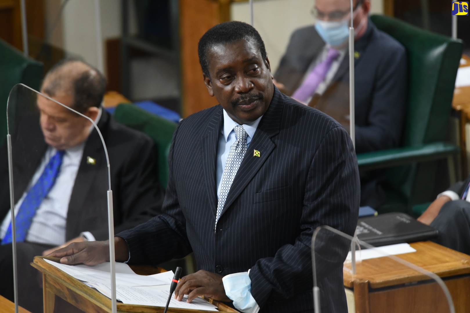 Minister of Transport and Mining, Hon. Robert Montague, pilots the Road Traffic (Amendment, Validation and Indemnity) Bill, 2021, during a special sitting of the House of Representatives on Friday (November 5). The legislation allows for the updating of fixed penalties for offences under the Road Traffic Act.