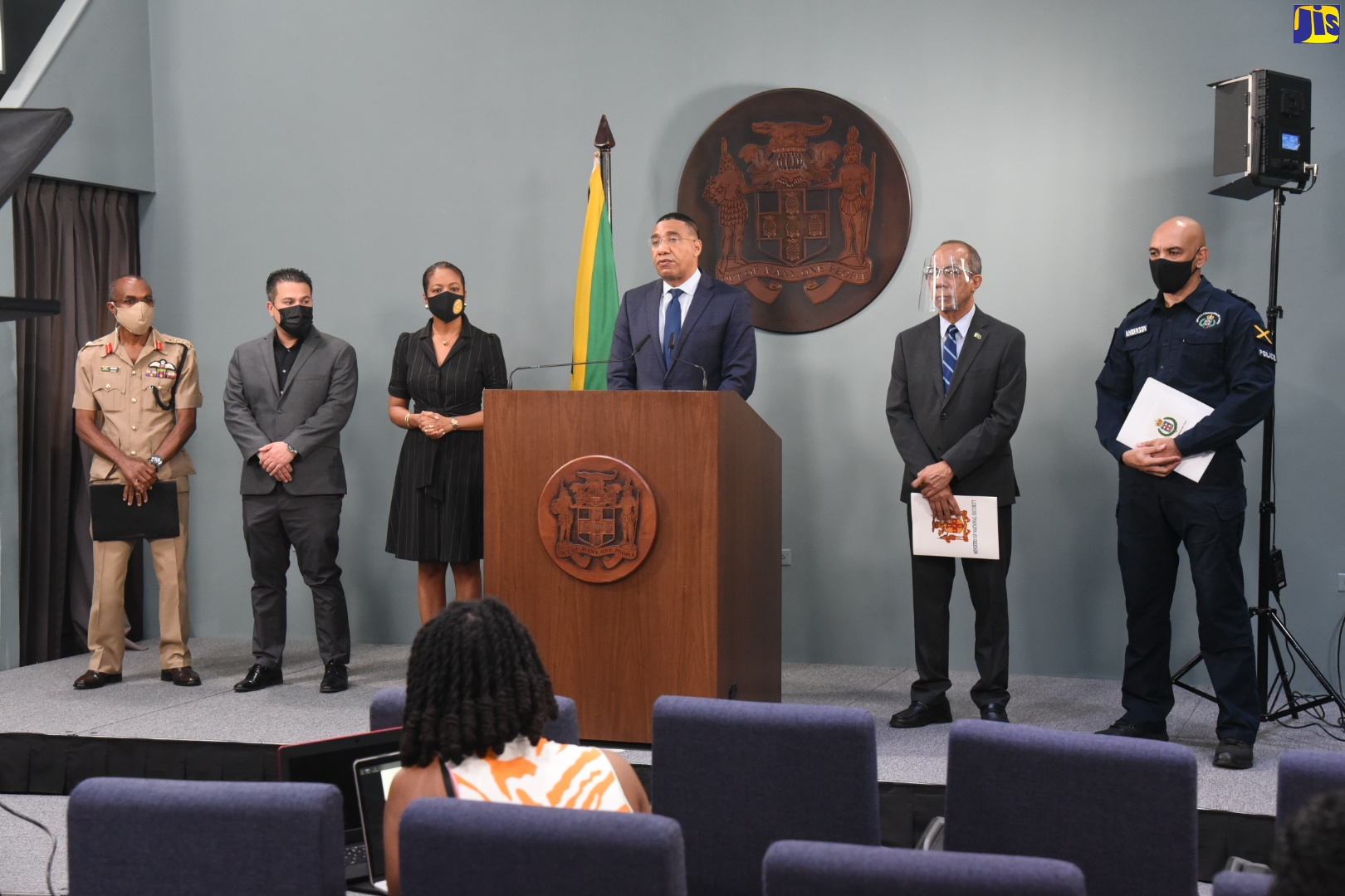 Prime Minister, the Most Hon. Andrew Holness (at podium), announces the declaration of states of public emergency in seven police divisions islandwide during a press conference on Sunday (November 14). The briefing was held in the Office of the Prime Minister (OPM) Media Room. From left are: Chief of Defence Staff, Lieutenant General Rocky Meade; Minister without Portfolio in the Ministry of National Security, Senator the Hon. Matthew Samuda; Attorney General, Hon. Marlene Malahoo Forte; Deputy Prime Minister and Minister of National Security, Hon. Dr. Horace Chang; and Police Commissioner, Major General Antony Anderson.