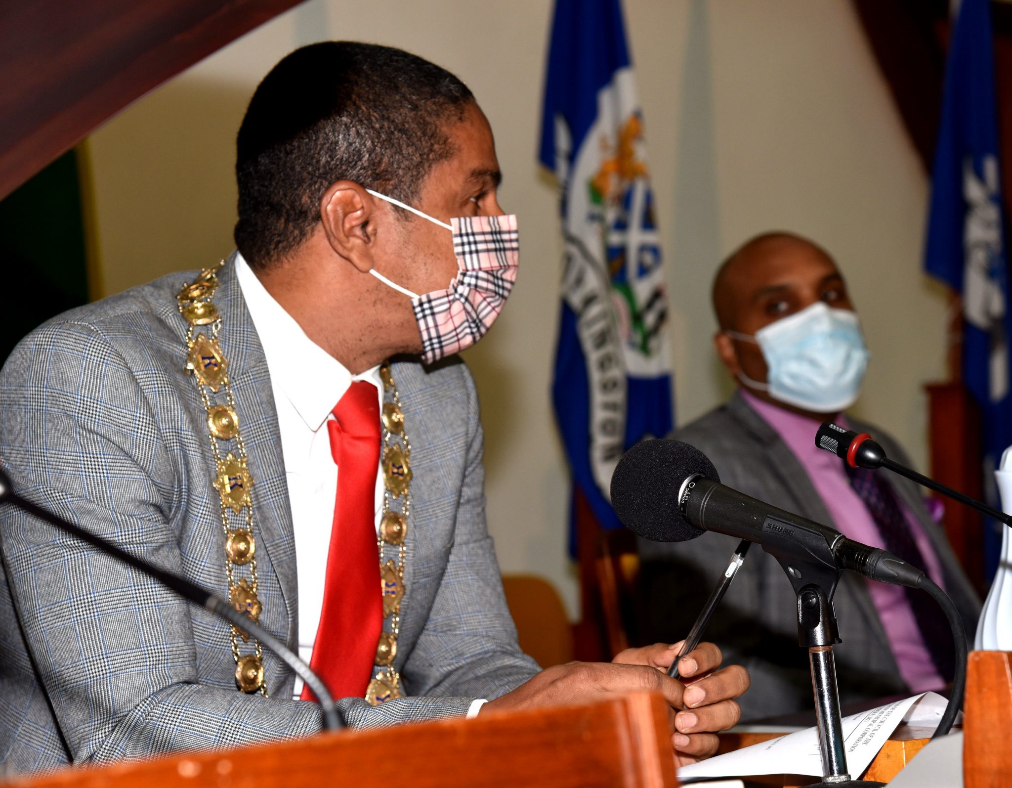 Mayor of Kingston, Senator Councillor Delroy Williams (left), addresses Tuesday's  (November 9) meeting of the Kingston and St. Andrew Municipal Corporation, at the Jamaica Conference Centre in downtown Kingston. With the Mayor is  Chief Executive Officer, Kingston and St. Andrew Municipal Corporation, Robert Hill.

