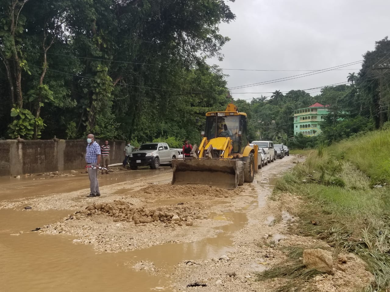 The National Works Agency (NWA) clears a section of the Unity Hall roadway in St. James after heavy rains on Monday (November 8).