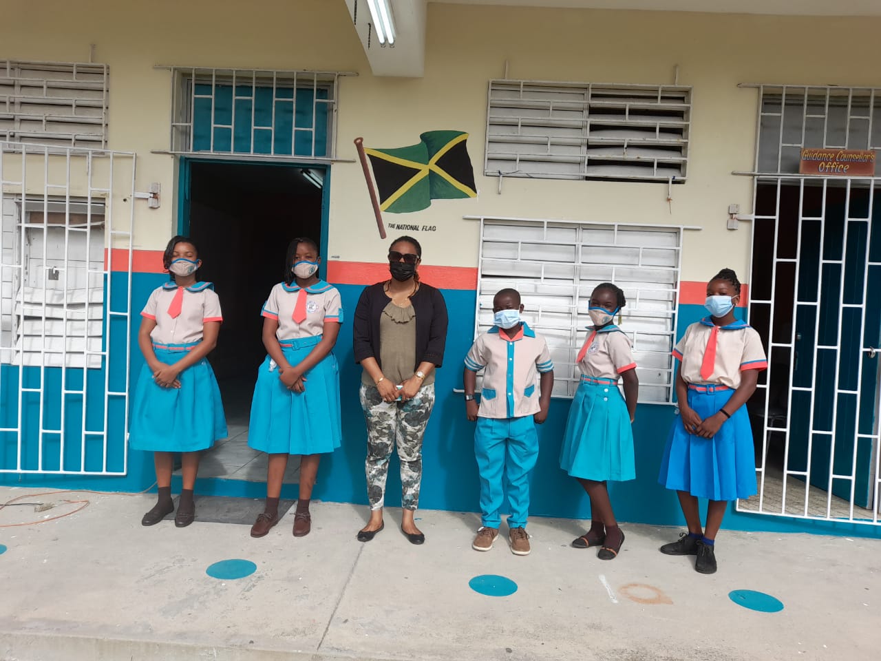 Chairman of the School Board at the Chalky Hill Primary & Infant School in St. Ann, Genevor Gordon-Baily (third left), with students (from left) Rasheda Stewart, Devonique Ward, Damaine Lawson, Shadiann Gayle, and Traci-Ann Taylor, during a visit to the school compound earlier this week.


