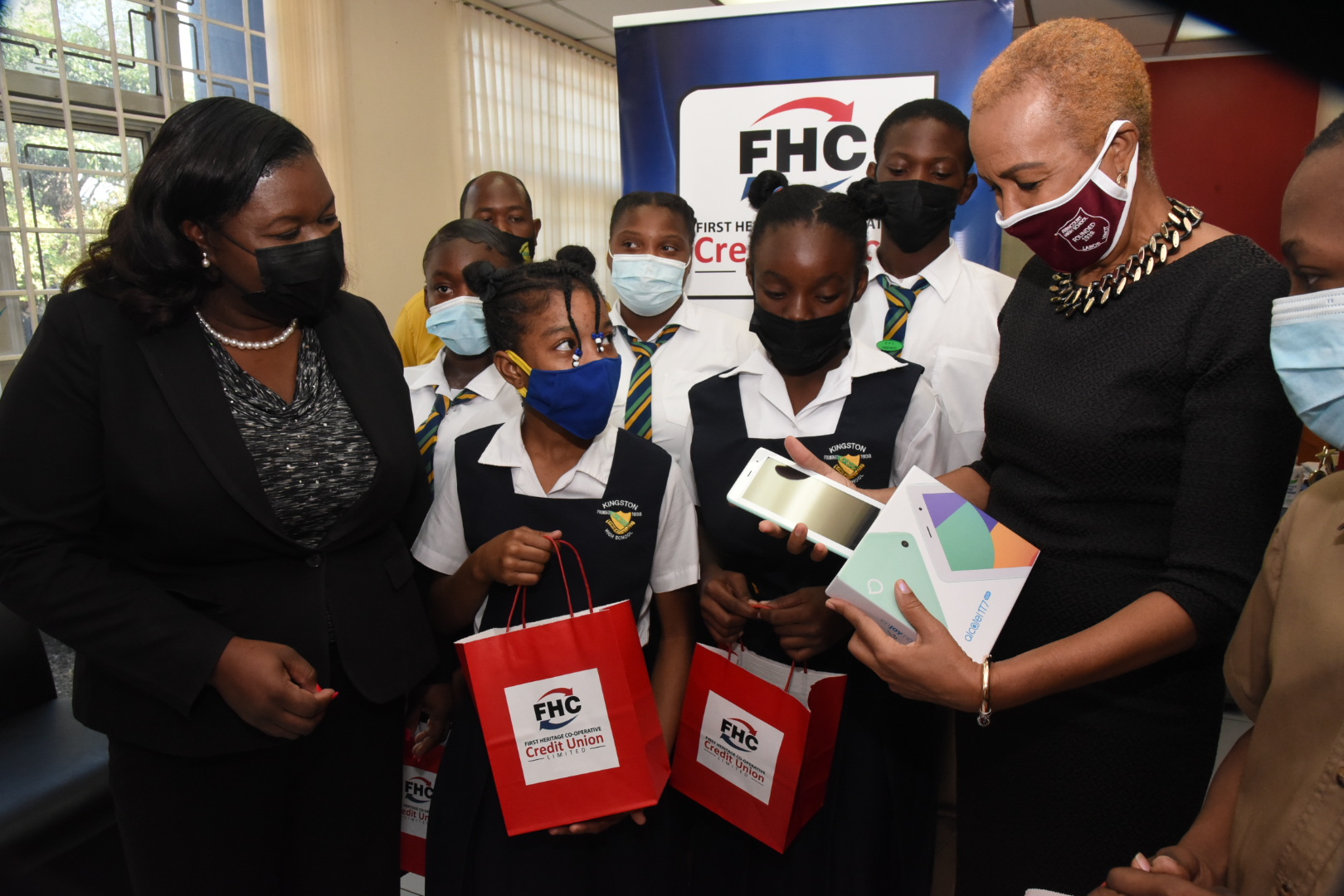 PHOTOS: First Heritage Donates Tablets to Kingston High School Students