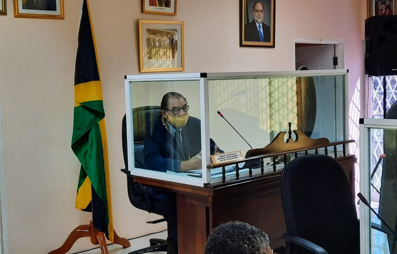 Mayor of Black River, Councillor Derrick Sangster, addresses the monthly meeting of the St. Elizabeth Municipal Corporation in the parish capital on Thursday (December 9).