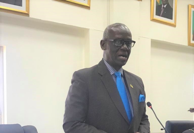 Minister of Local Government and Rural Development, Hon. Desmond McKenzie, addresses the monthly meeting of the Westmoreland Municipal Corporation, in Savanna-la-Mar, on Thursday (December 9).


